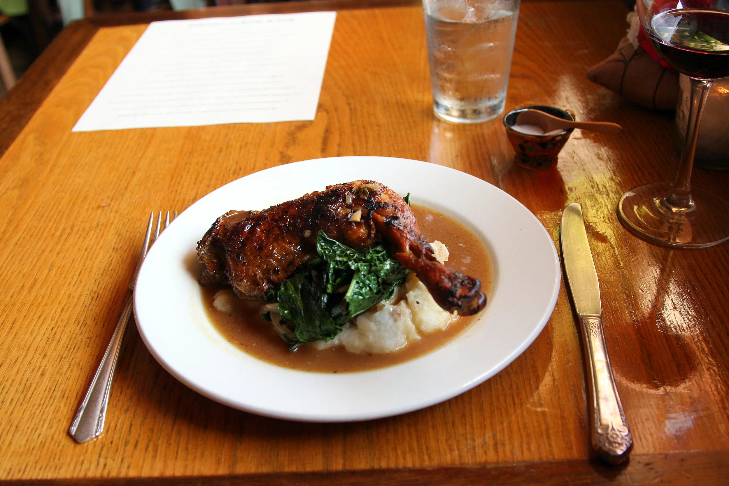 Braised chicken leg & thigh with lacinato kale and mashed potatoes