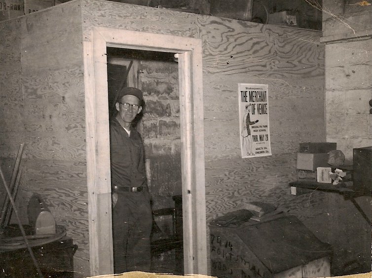  I found this photo in my father's things after he passed.&nbsp; This is my grandfather probably at his welding shop.&nbsp; On the wall is a poster of one of my favorite Shakespearean plays.&nbsp; I have no idea why this poster is on the wall, and I 