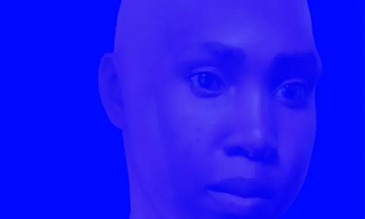 Up-close image of face on screen with high-intensity blue filter.