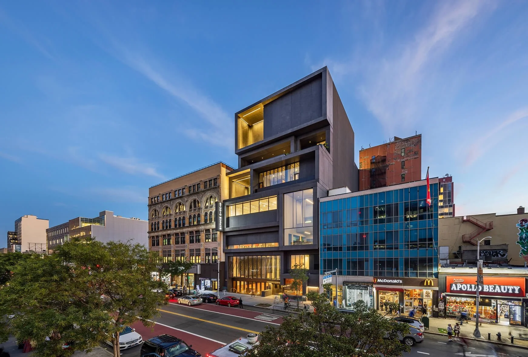 Exterior view of street corner where the Studio Museum in Harlem is located.