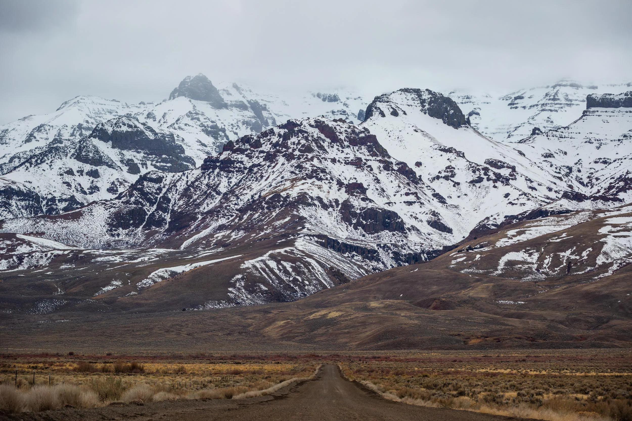  Empty dirt roads along the snowy Steens Mountains near the Alvord Desert in Southern Oregon. 