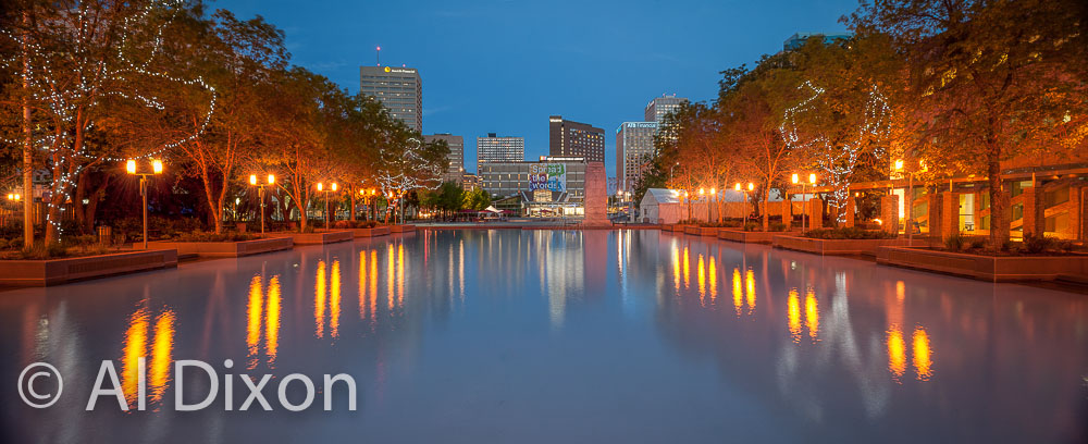 Looking across the wading pond in front of City Hall towards Churchill Square.