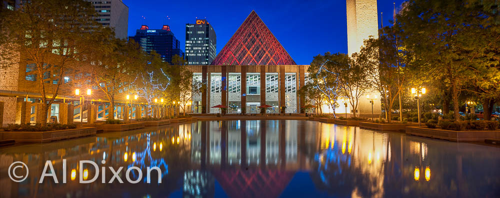 City Hall lit up at night.