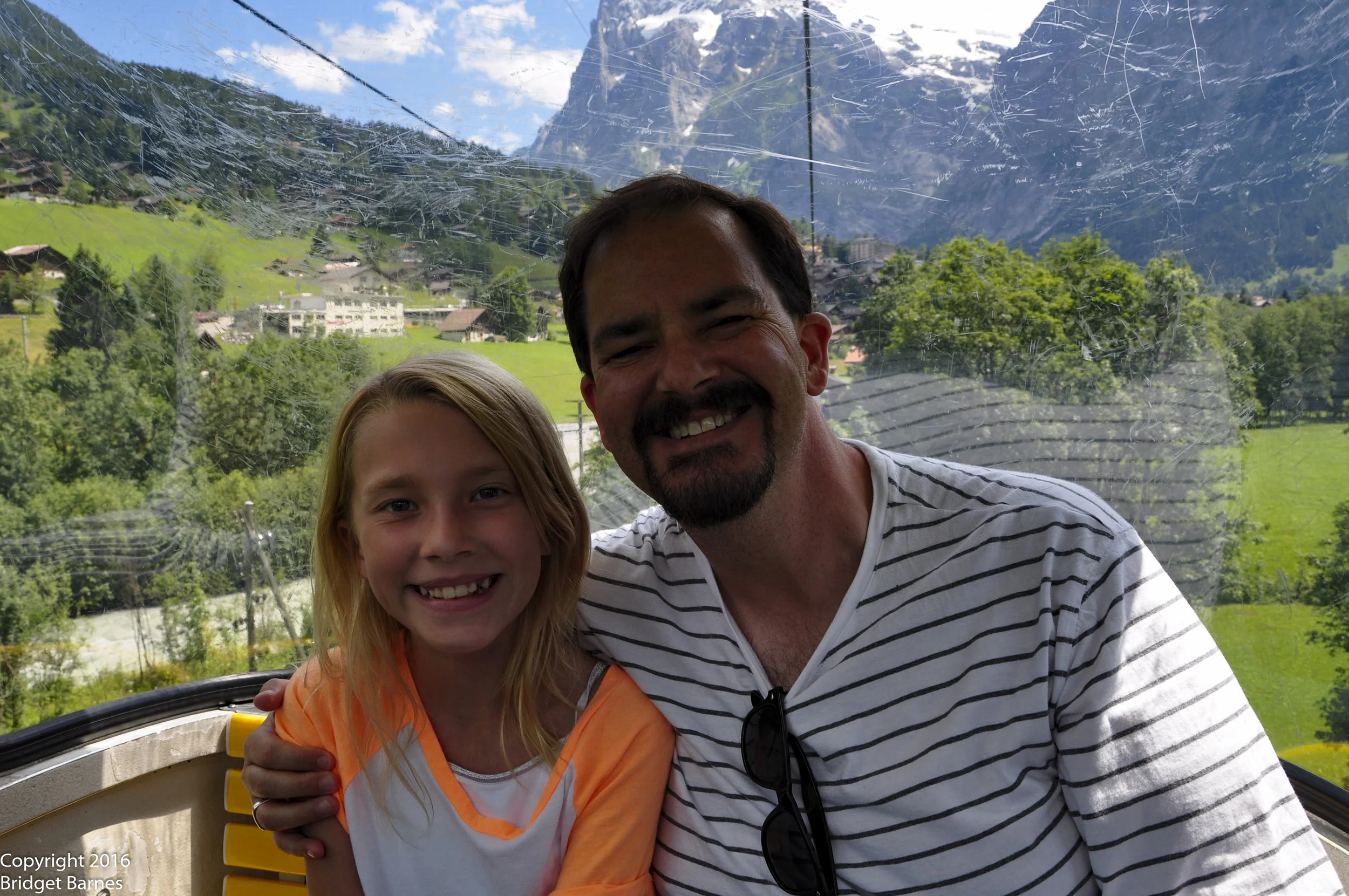 The girl and the man on the Mannlichen gondola...Look at that view!