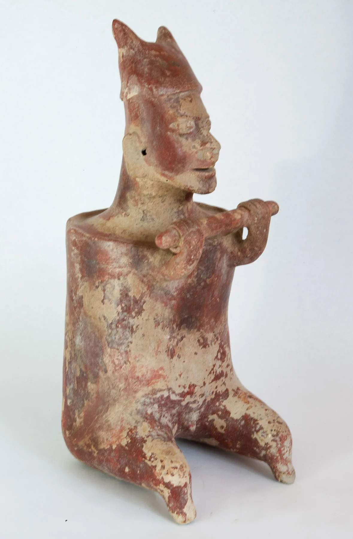 Nayarit figure of a warrior with club.