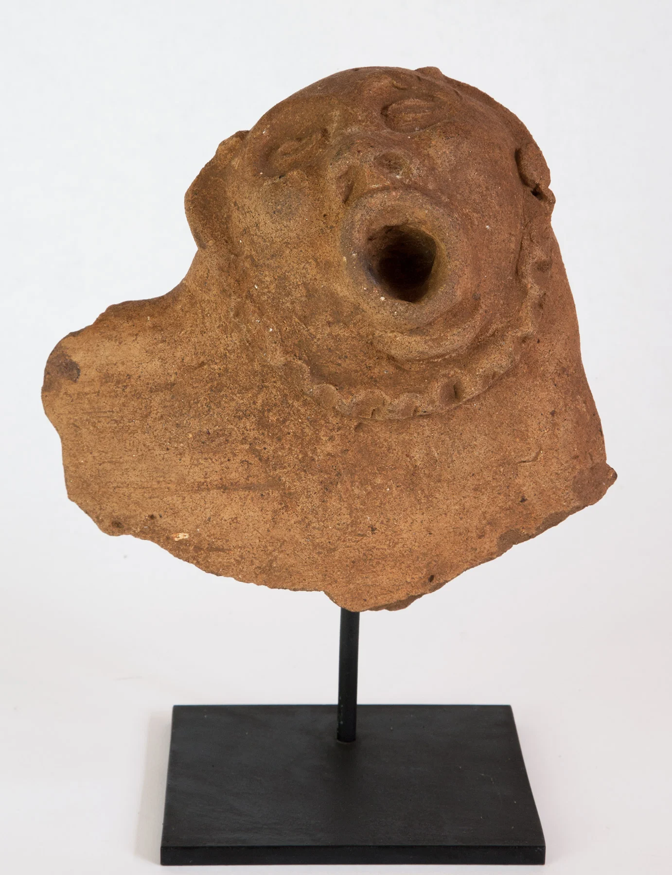 Fragment of a large vessel with the face of a crying or singing monkey or human. Said to be Maya. 600-900 AD 6-1/2" high
