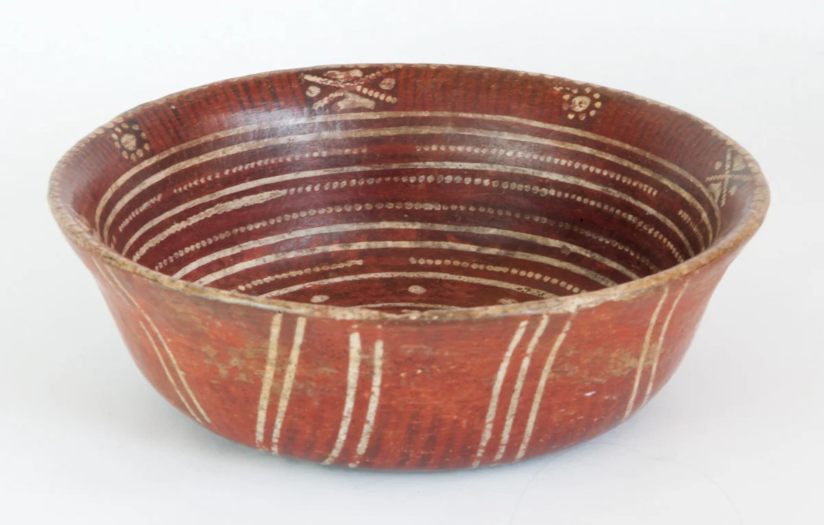 Zacatecas bowl with red slip and white painted concentric circles. A design, possibly astronomical, alternates around the inner rim. 200 BC-200 AD 8" dia x 2-1/2" high
