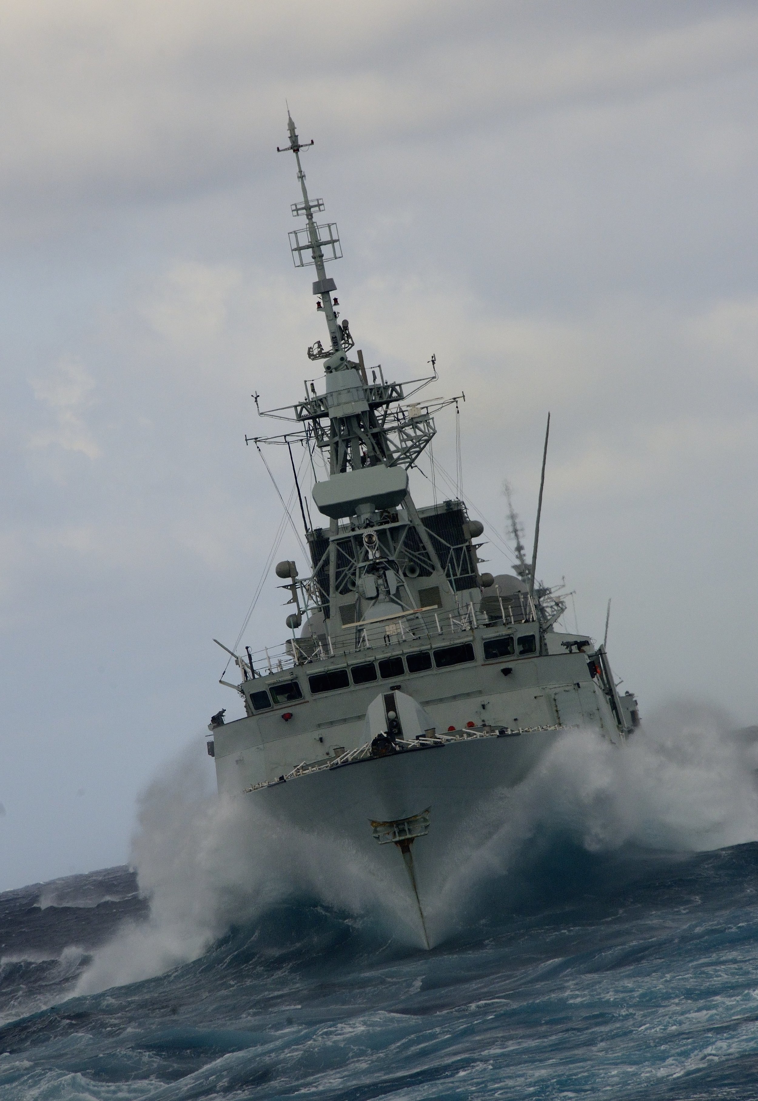 One of the Halifax-Class frigates with a 'bone in her teeth.'