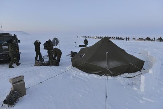 Setting-up a tent during NOREX '15.