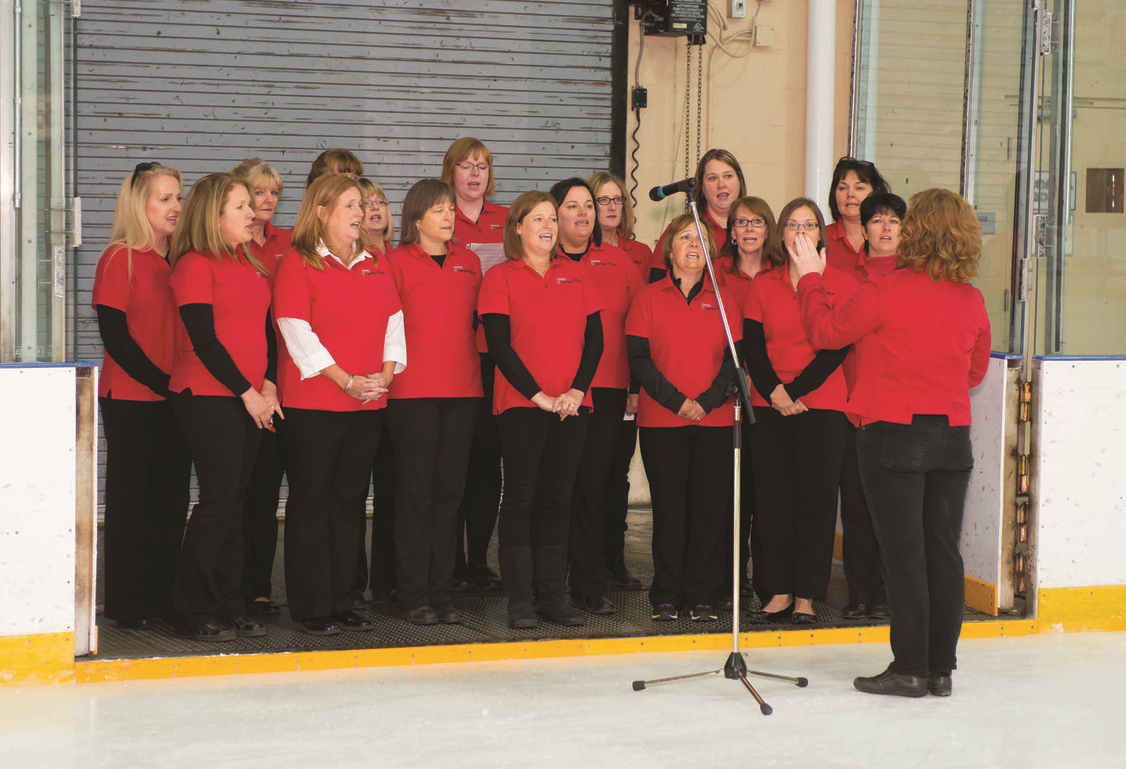 The Canadian Military Wives Choir performed the national anthem before the hockey game between the General Officers and Flag Officers (GOFOs) of the Canadian Armed Forces and the Esprit de Corps Commandos. (Richard Lawrence)