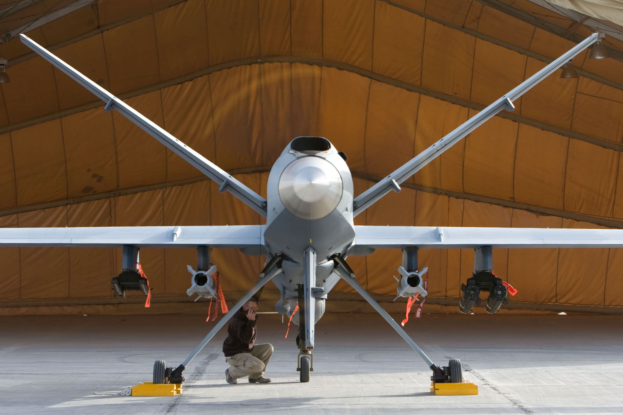 A maintenance airman inspects an American MQ-9 Reaper UAV in Afghanistan. Reapers are capable of striking enemy targets with on-board weapons, and have conducted close air support and intelligence, surveillance and reconnaissance missions. Canada leased Unmanned Aerial Vehicles or UAVs in Afghanistan, but none of them matched the capabilities of the Reaper. (USAF)