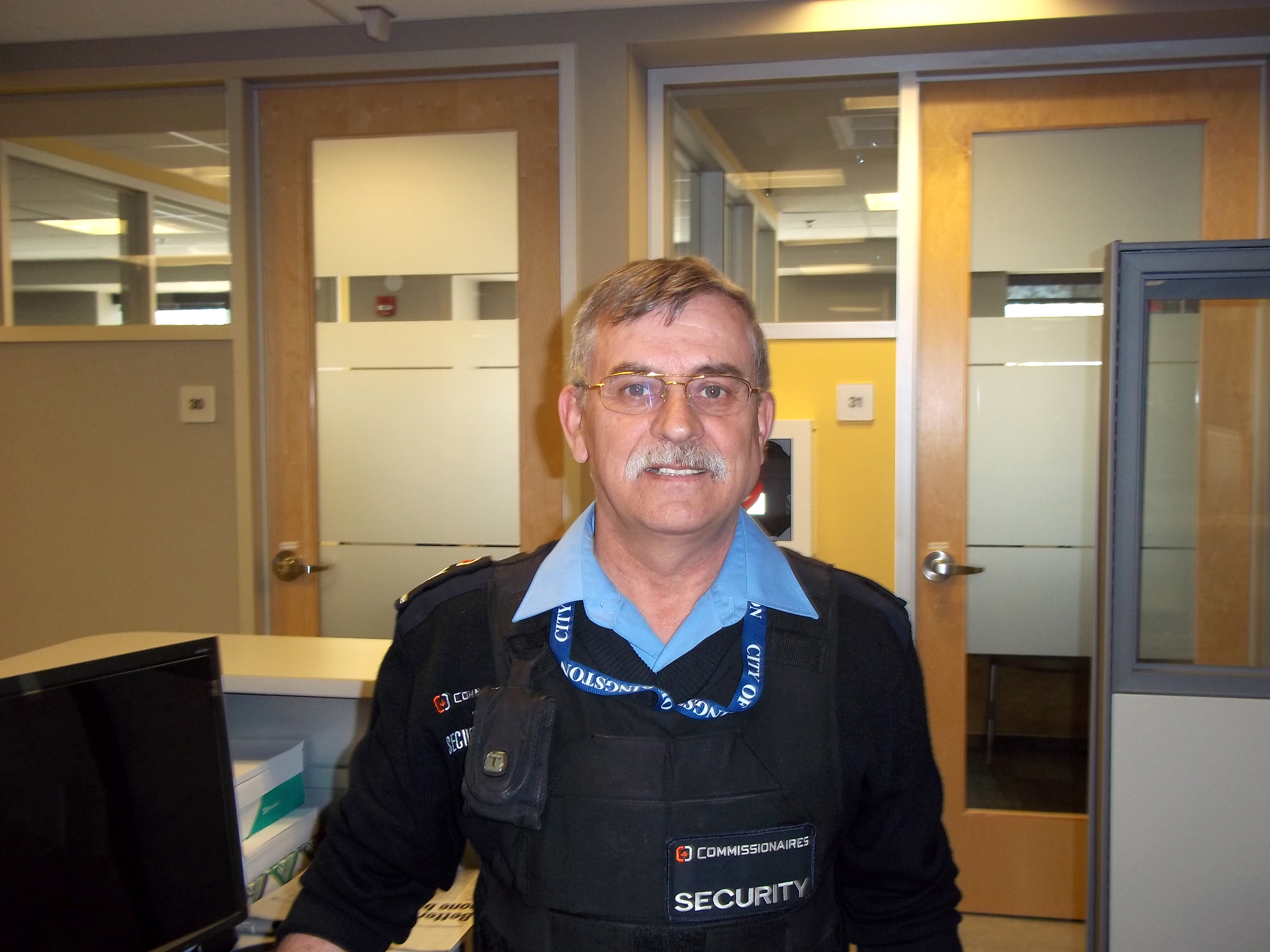 Commissionaire Joe Thomas retired from the CAF and is now the security supervisor at Kingston's housing and social services department. 