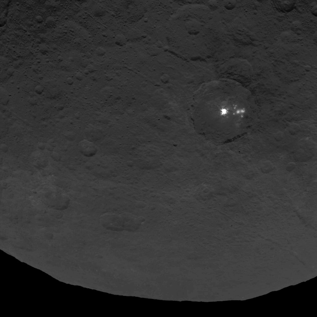 A photo of the bright spots found on the surface of Ceres. Scientists are still trying to determine what they could be. (NASA photo). 