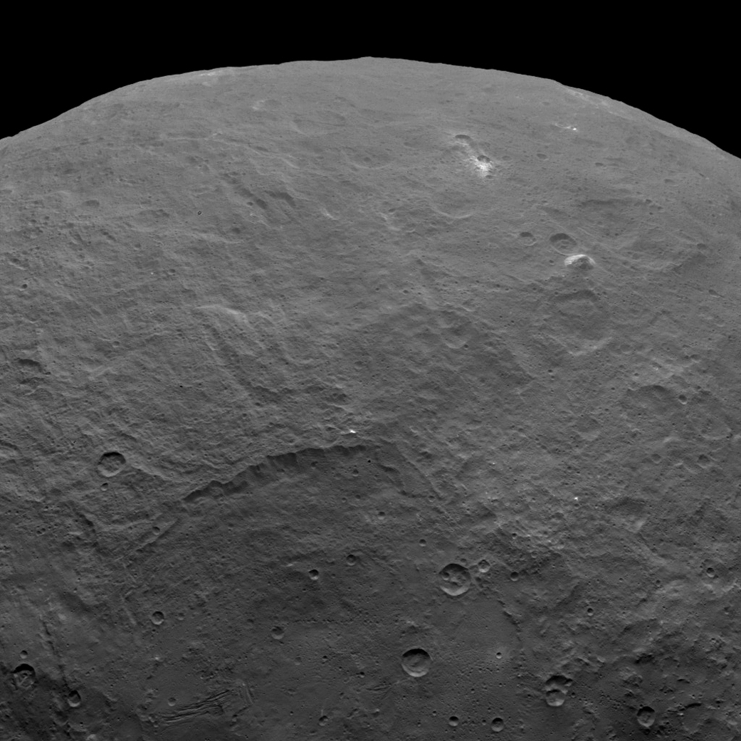 Equally mysterious is how the mountain, top right, formed on the relatively flat surface of Ceres. (NASA photo). 