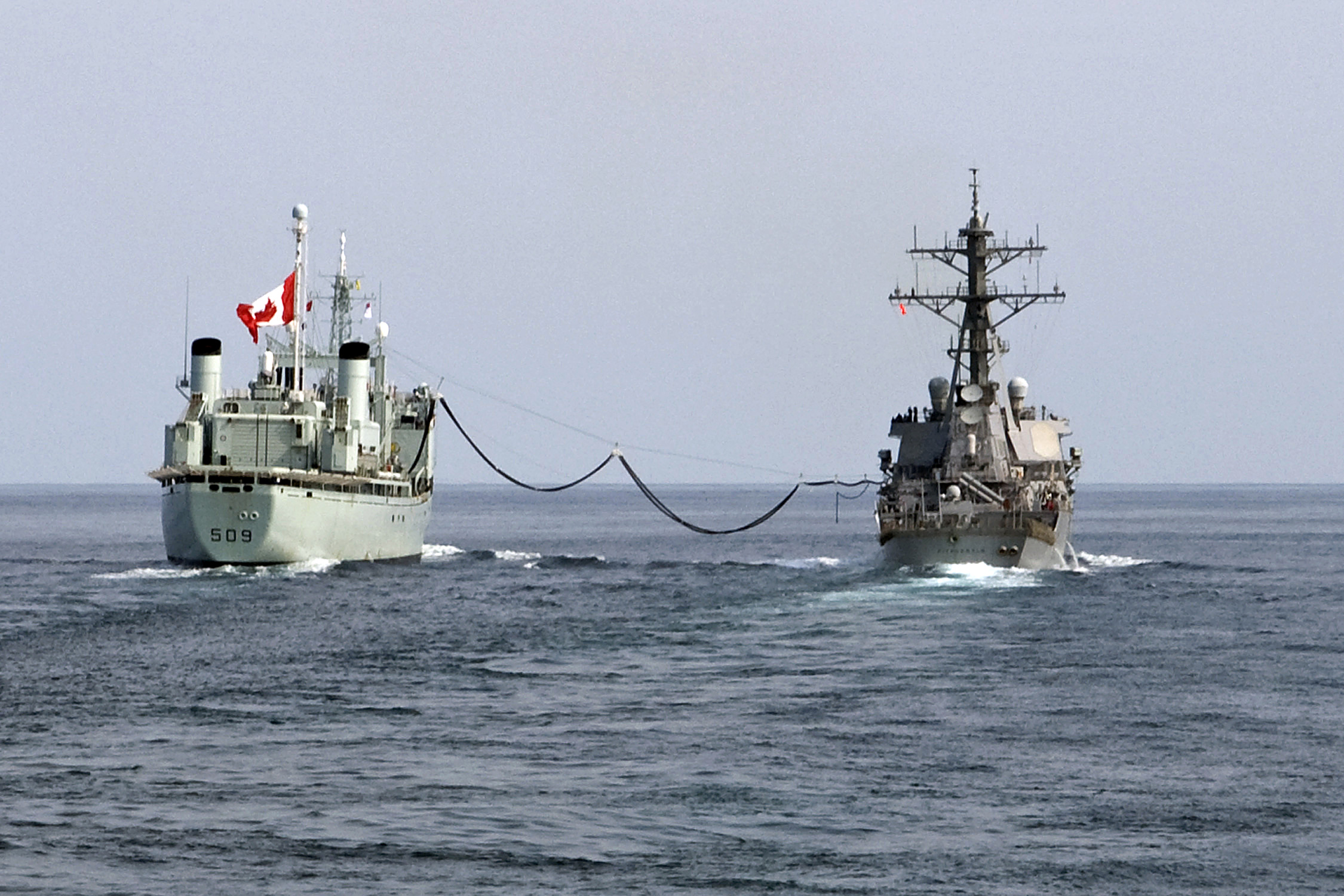 HMCS Protecteur transfers fuel to the USS Fitzgerald in 2009. Since the loss of Canada's resupply ships, the RCN has had to rely on allies to resupply at sea. (U.S. Navy)