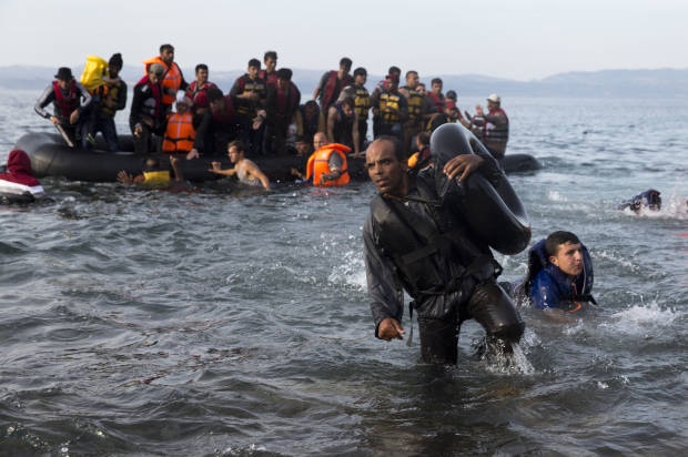 Refugees and migrants arriving from Turkey to Lesbos, Greece on September 9, 2015. (AP/Petros Giannakouris)