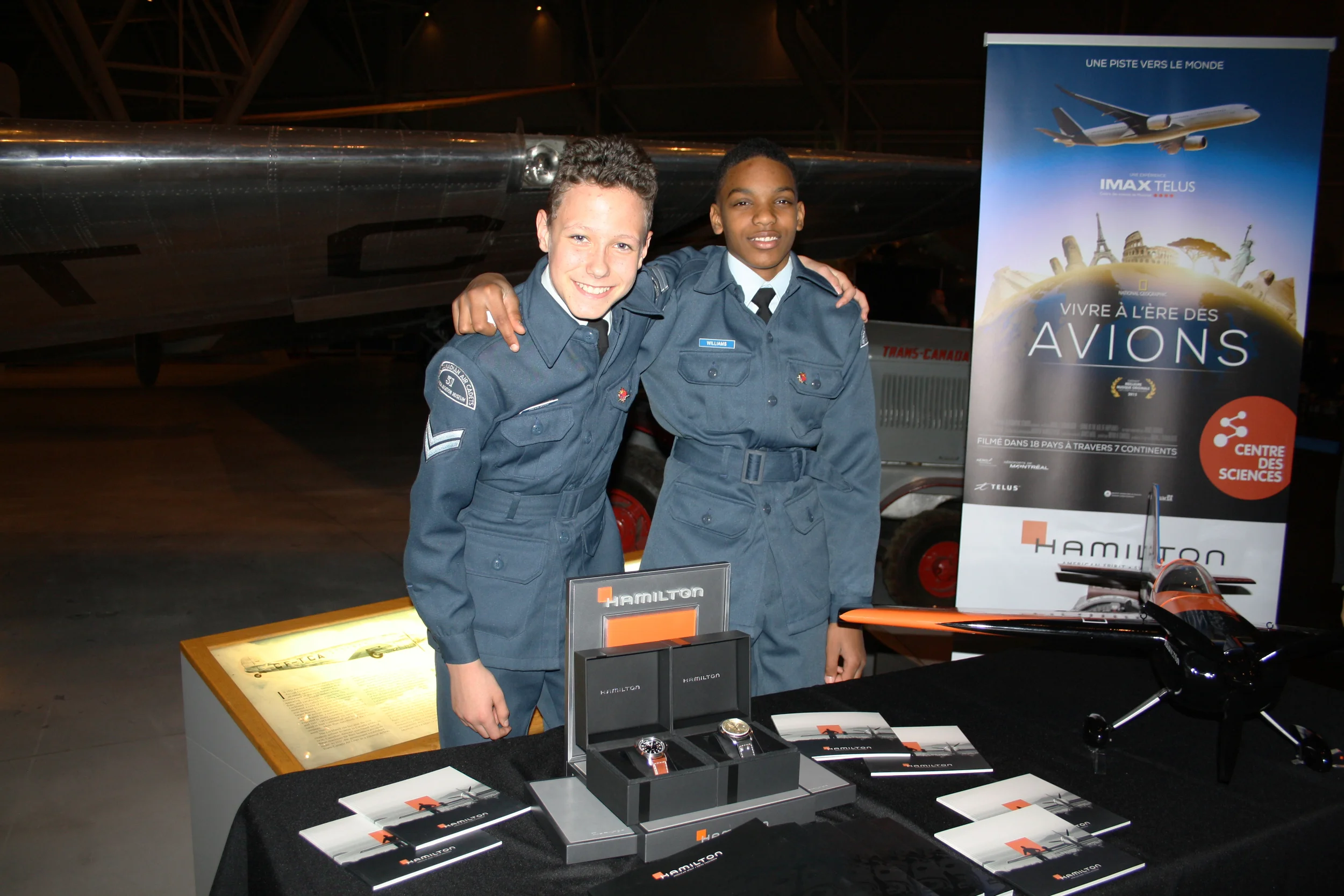 Hamilton Watches, the official timekeeper of the Air Cadet League of Canada, provides each year watches to the 2 top air cadet pilots. Many Air Cadets, like the two young men in the photo, provided their help that evening. (Sitraka Raoelimanohisoa)