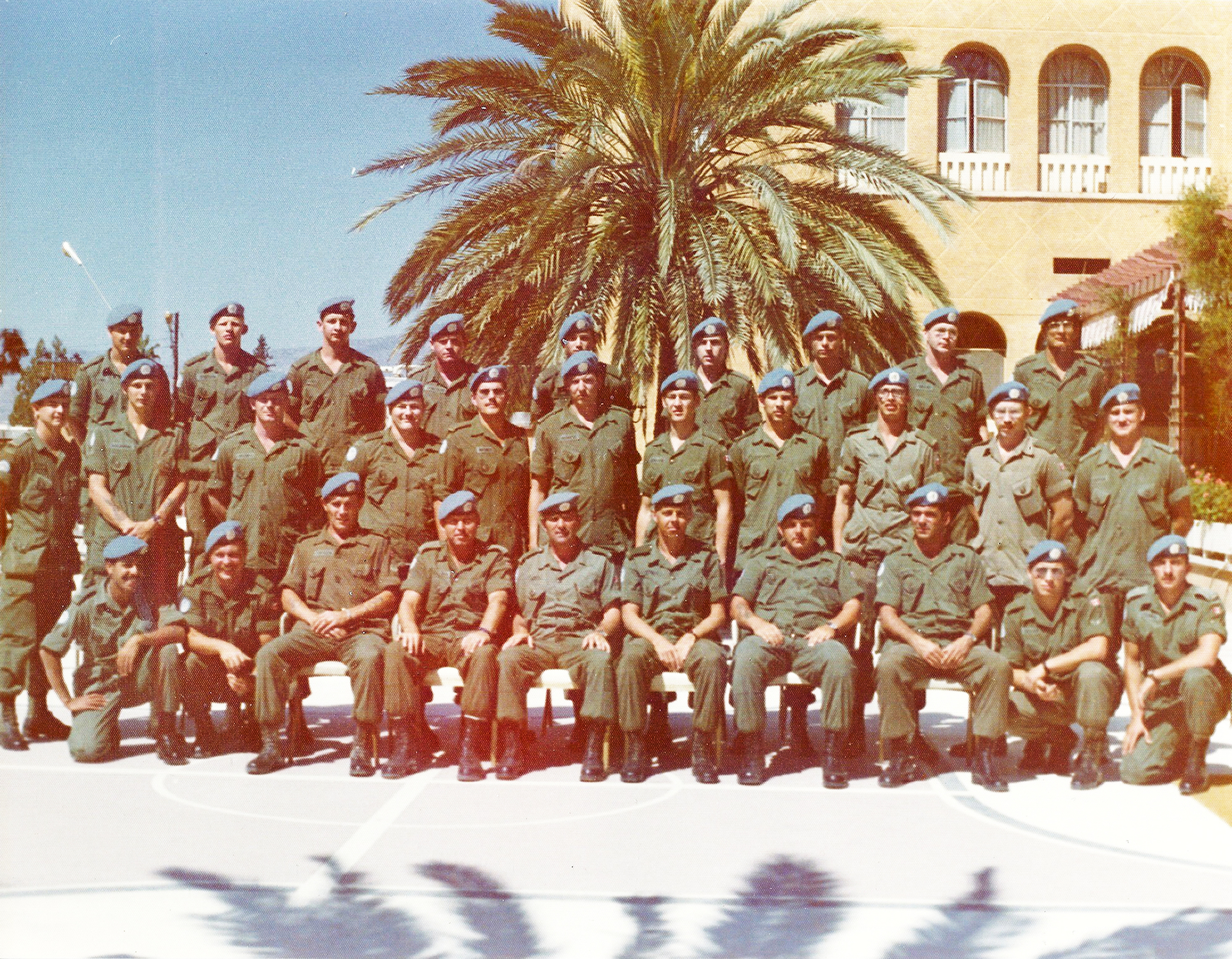 The fine handsome lads of "B" Company, 6 Platoon, 1. The Royal Canadian Regiment pose in front of the Ledra Palace Hotel in Nicosia, Cyprus in December 1974. The situation on the Mediterranean island reached its zenith in July 1974, when the Greek Cypriots launched a coup d'etat that was matched with the landing of a sizeable Turkish force days later. To this day, the United Nations Peacekeeping Force in Cyprus (UNFICYP) is deployed on the small island to supervise a ceasefire and maintain a buffer zone between the Greek and Turkish communities. (1 RCR Photographer)