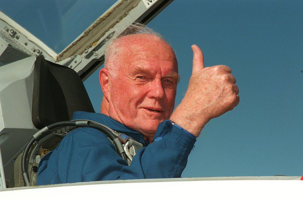 John Glenn, happily sitting in NASA’s jet trainer, the T-38 Talon.