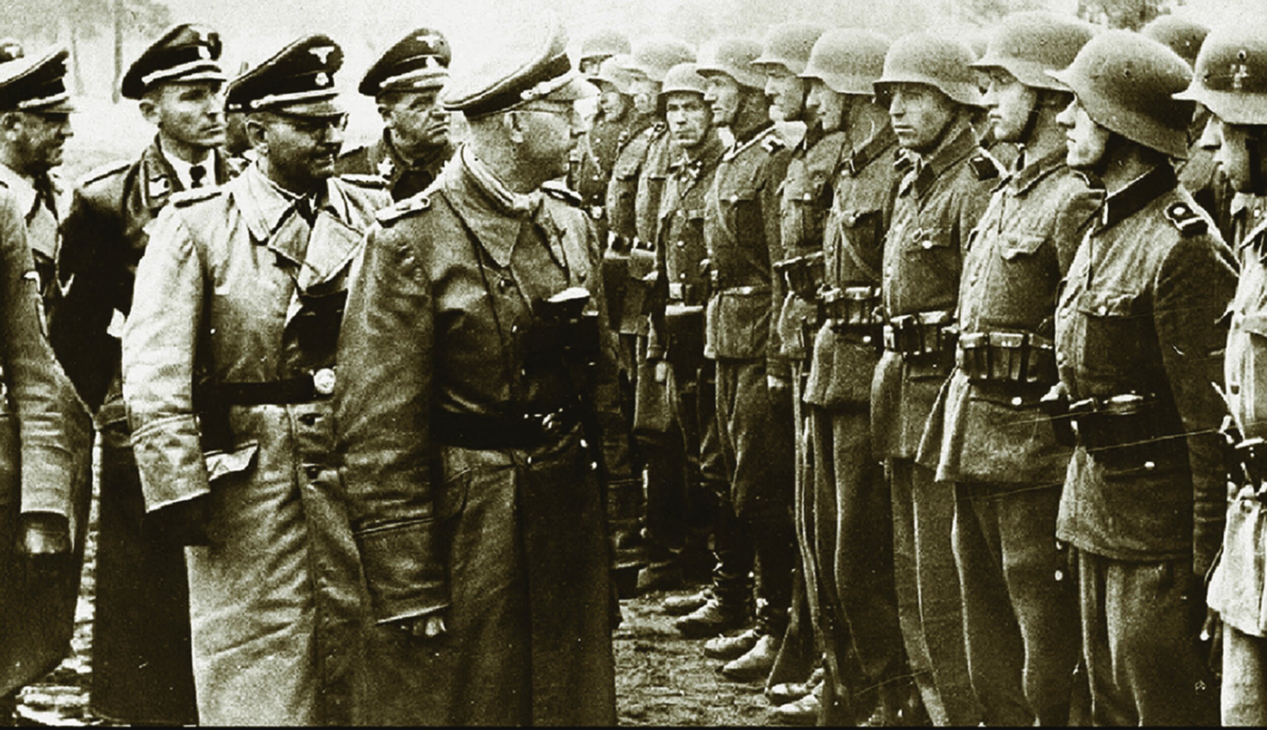 Heinrich Himmler, SS leader and one of the architects of the murder of six million Jews, inspects the Ukrainians who volunteered for the 14th SS Division Galicia. After the war around 2,000 member of the division were allowed to come to live in Cana…