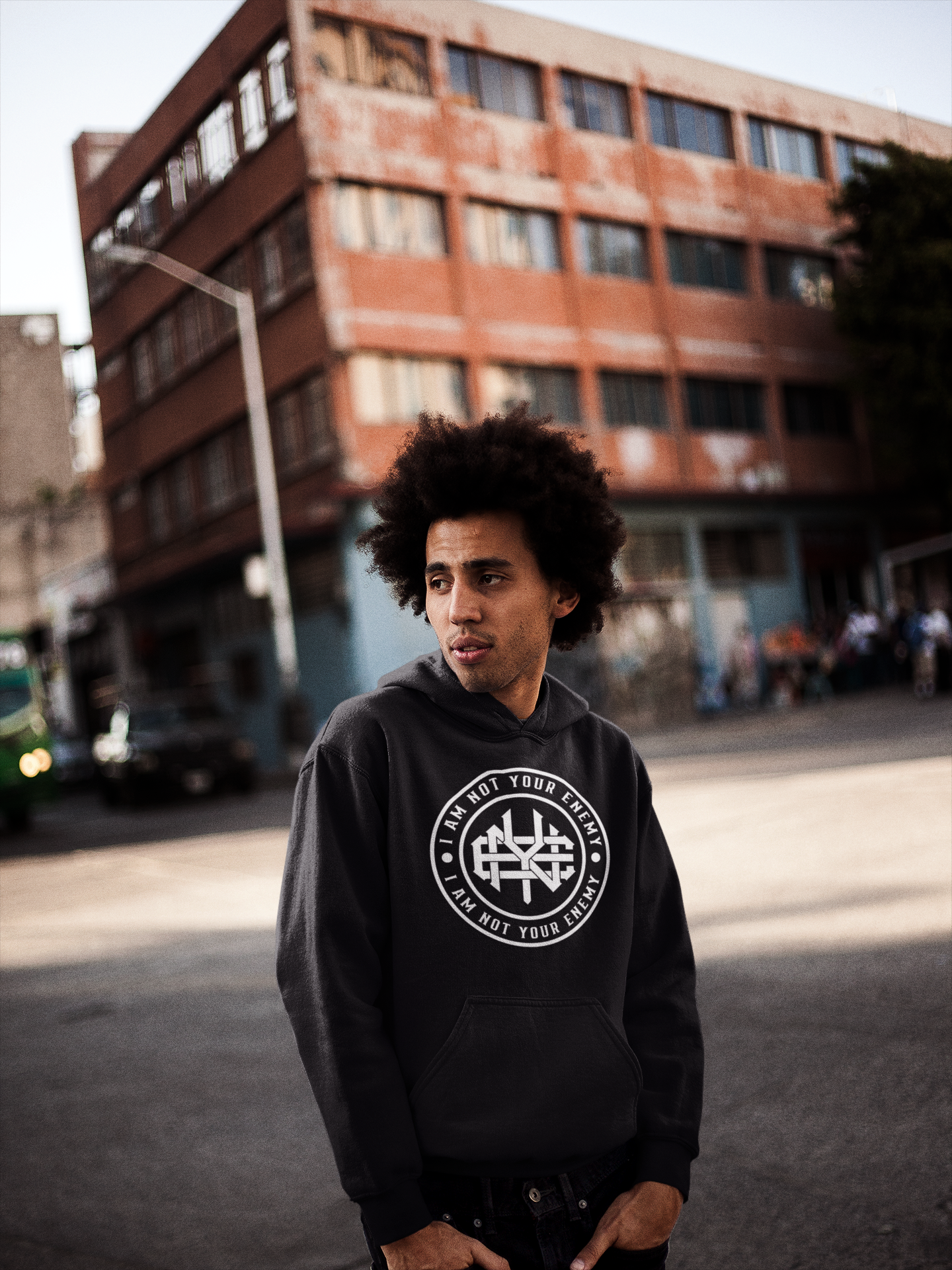 man-wearing-a-hoodie-mockup-on-the-street-a18947.png