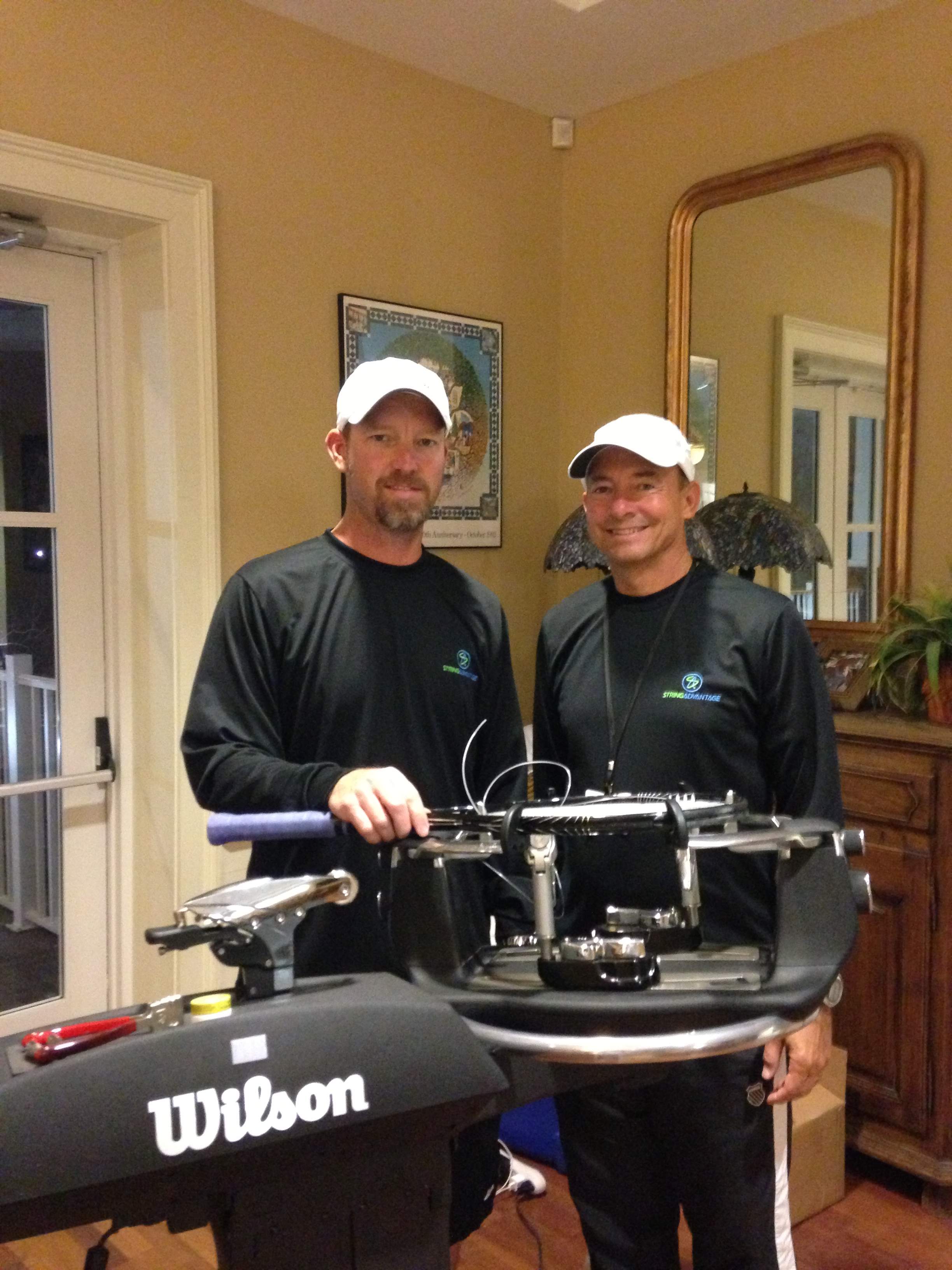 Dustin (l) and Kin working at the 2013 Family Circle Cup