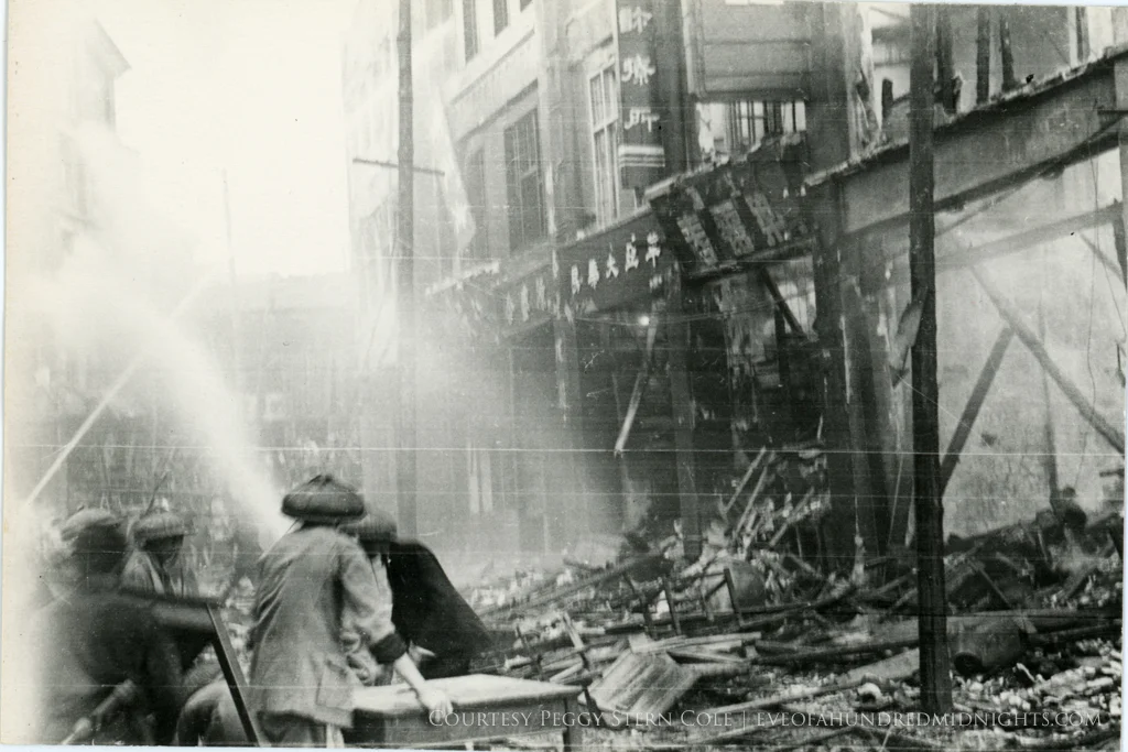Burning Facade as Men Move Desk.jpg