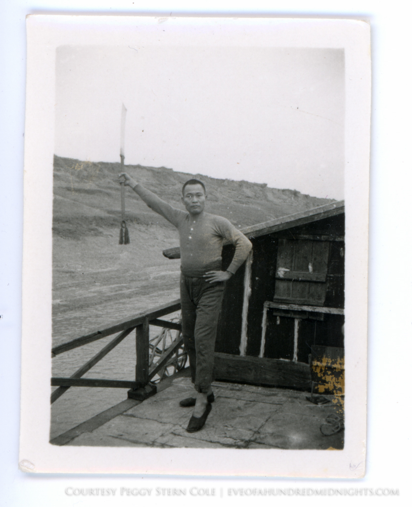 Man With Bladed Weapon on Boat Deck.jpg