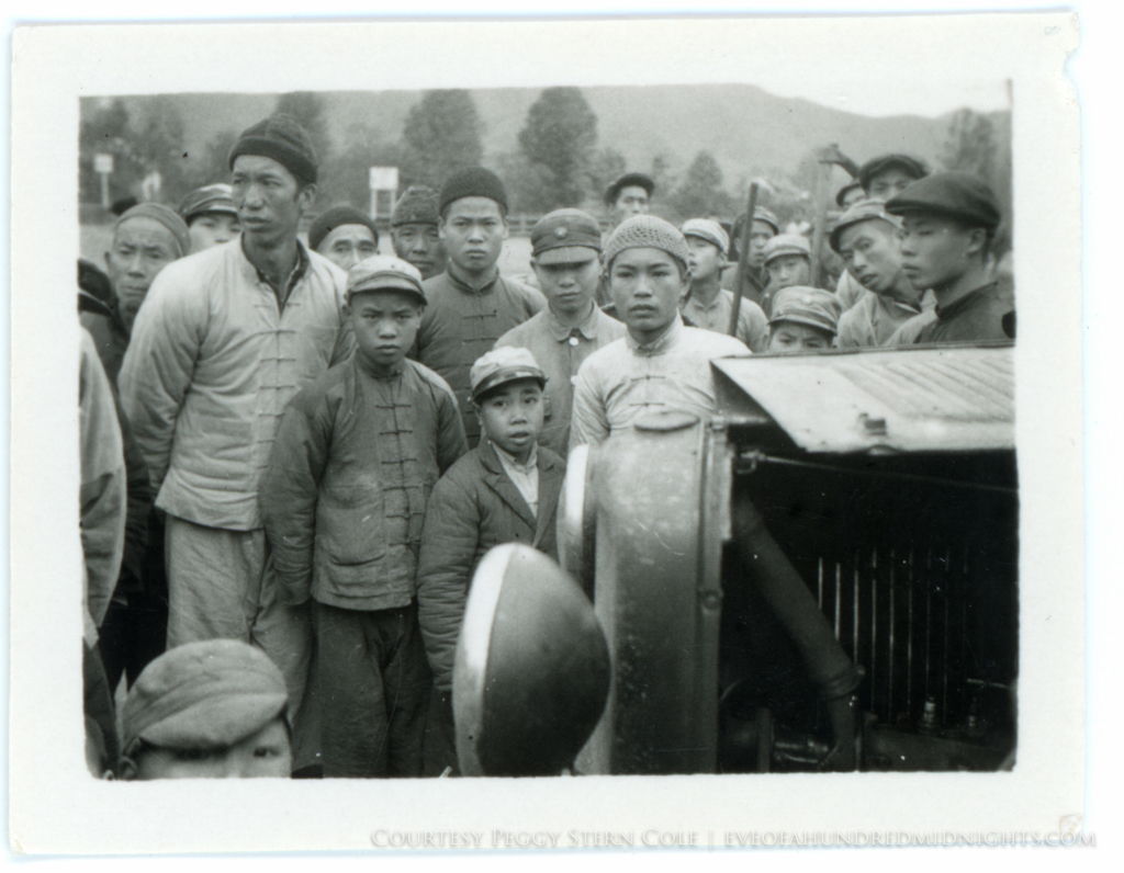 Young Men In Front of Car a Little Upset.jpg