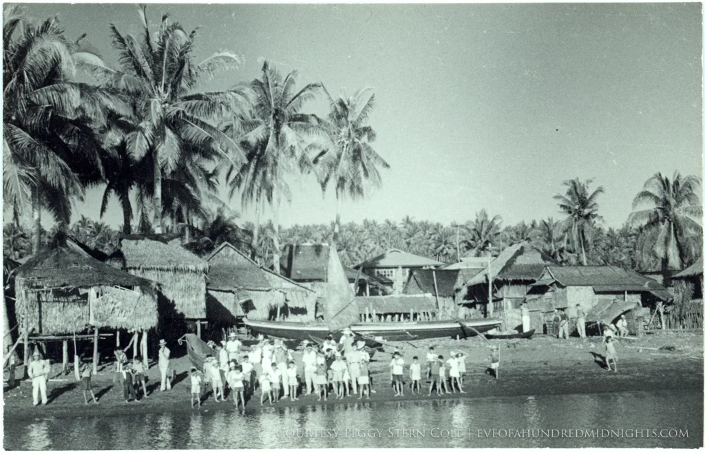 Filipino Villagers Watching From Shore.jpg
