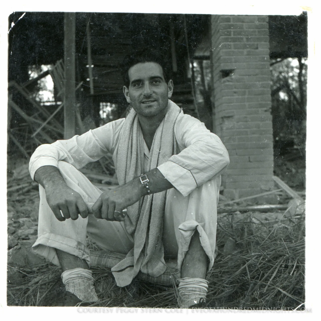 Melville Jacoby in front of the ruined Chungking Press Hostel