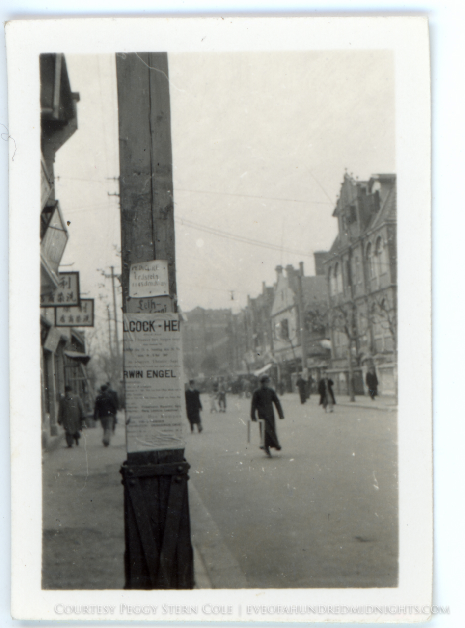 Shanghai Street with Ads on Telephone Pole.jpg