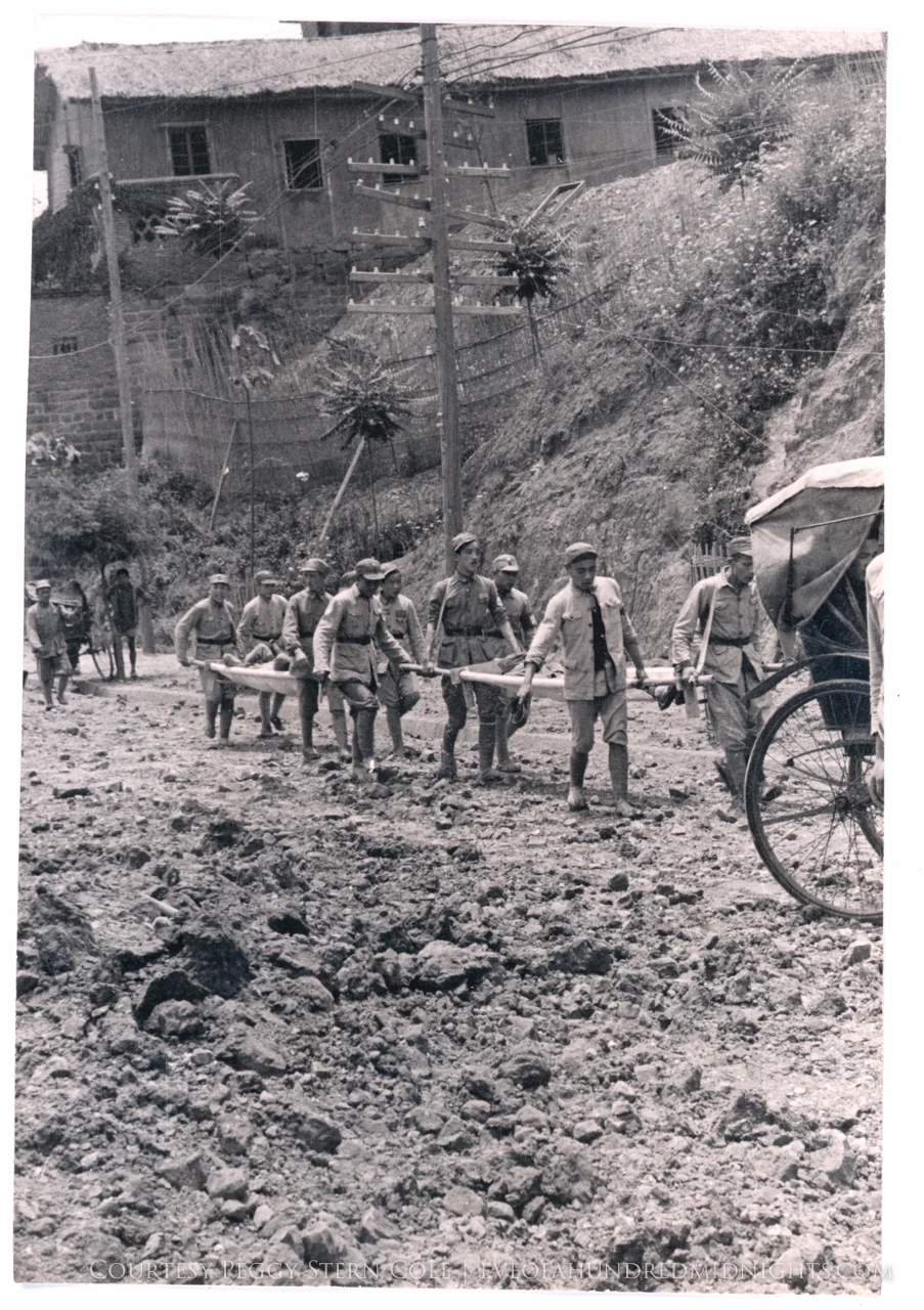 Men with more stretchers.jpg