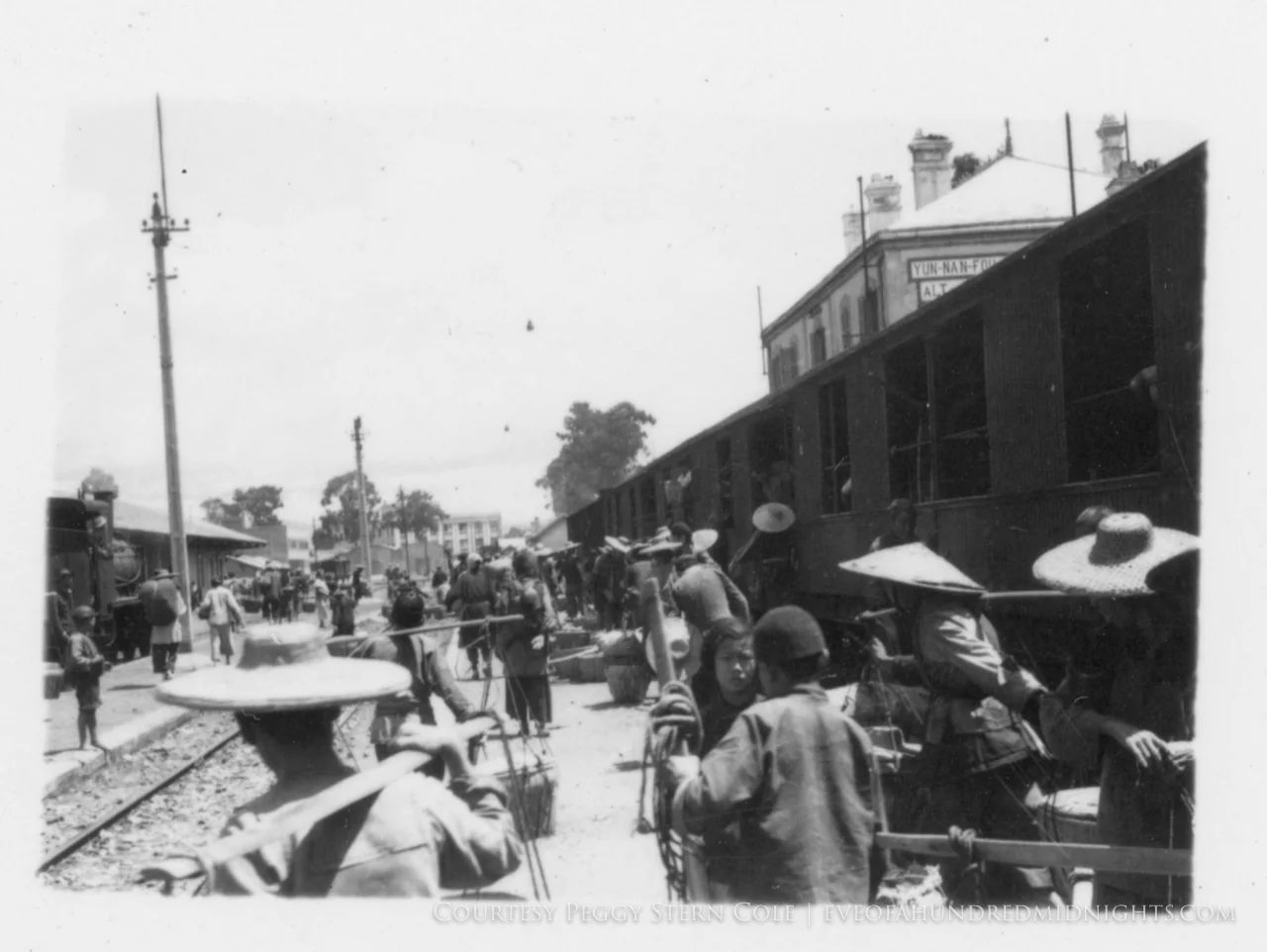 Crowds on Train Platform in Yunnan Over Heads.jpg