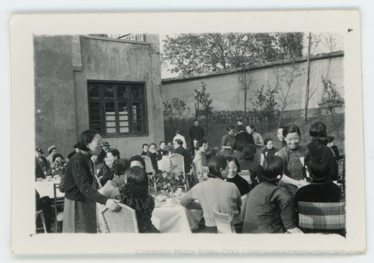 Women smiling as they greet people at Soong Sisters Event.jpg