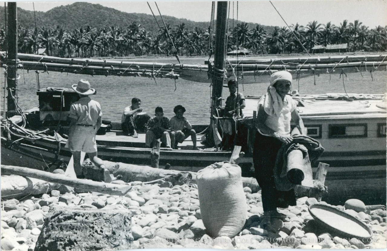 Woman unloading sailboat in Philippines 1.jpg