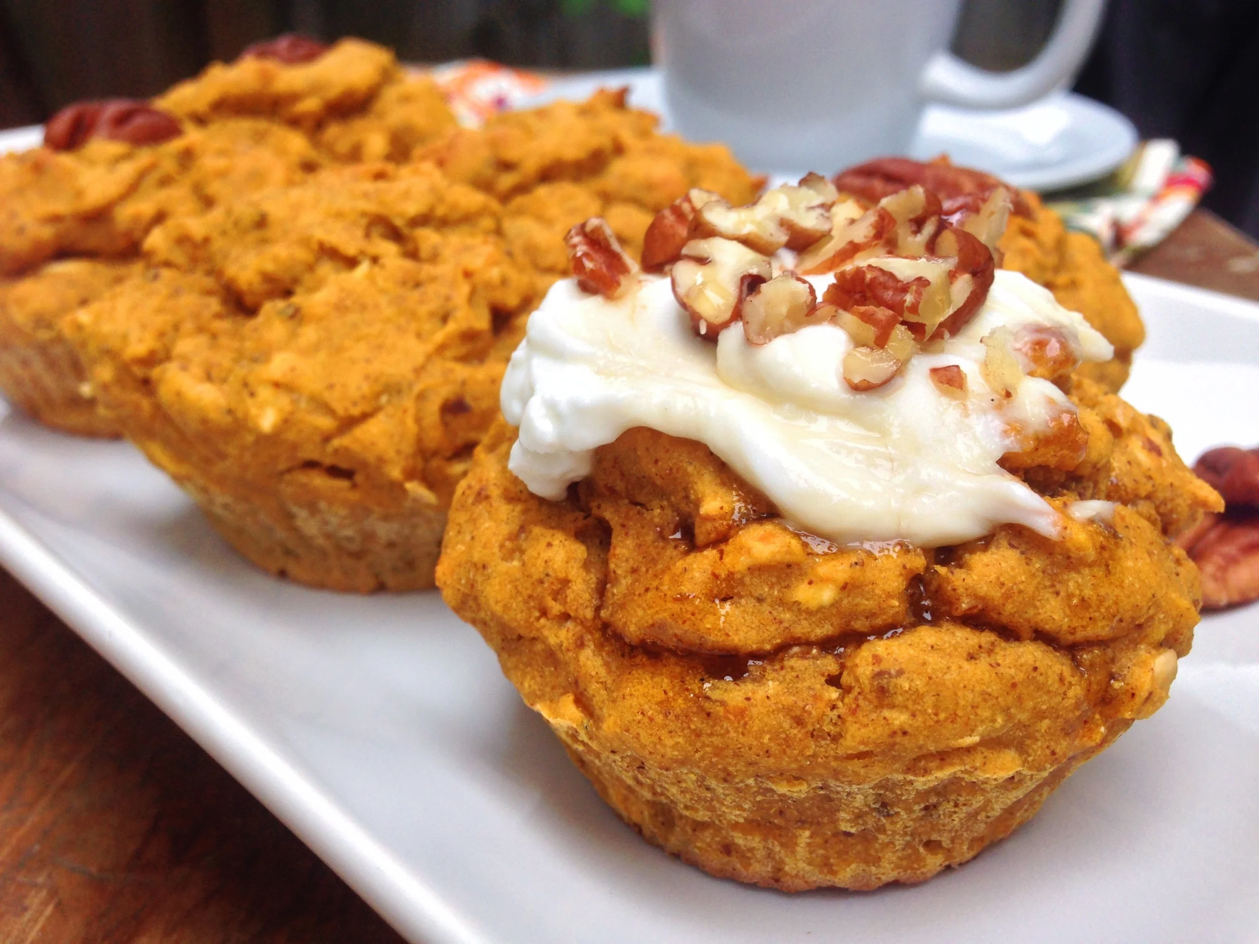 Pumpkin Apple Muffins 2 eggs, room temp 1/2 cup cooked pumpkin puree or canned organic pumpkin 1/3 cup raw honey 1/4 cup unrefined organic coconut oil 1 tsp vanilla 2 1/2 cups, loose not packed almond flour 1/2 tsp baking soda 1/4 tsp sea salt 1/1/2 tsp cinnamon 1/2 tsp nutmeg 1/4 tsp cloves 1/4 tsp ginger 1 chopped, peeled granny smith apple Preheat the oven to 350'. Mix the dry ingredients together. Whip the eggs and add vanilla. Mix in the pumpkin until evenly distributed. Add the wet ingredients to the dry and mix for 1 minute on medium speed. Add the apples and mix for another 30 seconds. Prepare your tins with either cupcake liners or grease muffin tin with coconut oil and a light dusting of almond flour. Fill the liners above the 3/4 line and stick in the oven for up to 20 minutes or until brown on the outside and a toothpick comes out clean. This makes approx 12 muffins. Enjoy your breakfast!