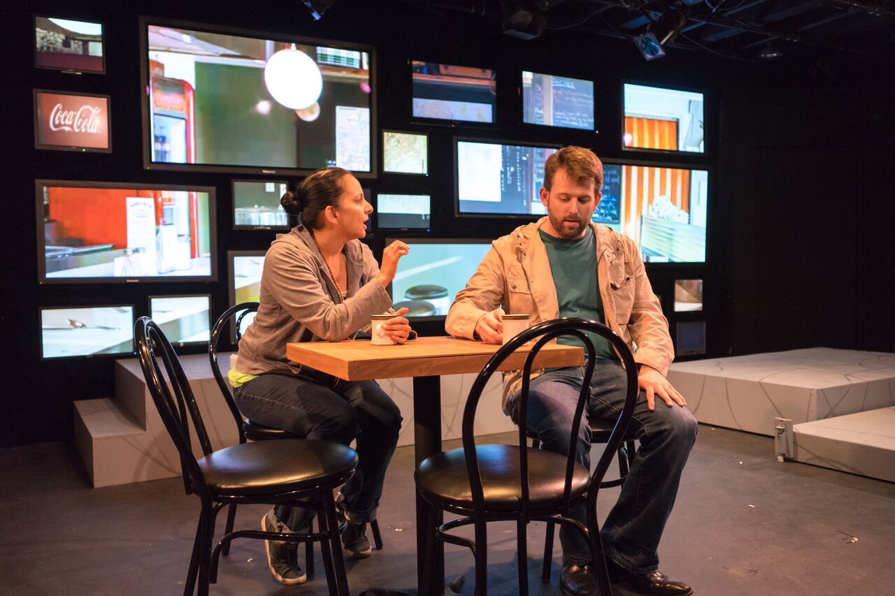 "The main element in Ryan DeRoos’ set design is a video wall, an ingenious solution to the problem of how to capture those distinctive worlds in the tiny Cellar space. Video elements (deftly crafted by Megan Reilly) make very clear where everything is taking place." My San Antonio, 7/3/2015
