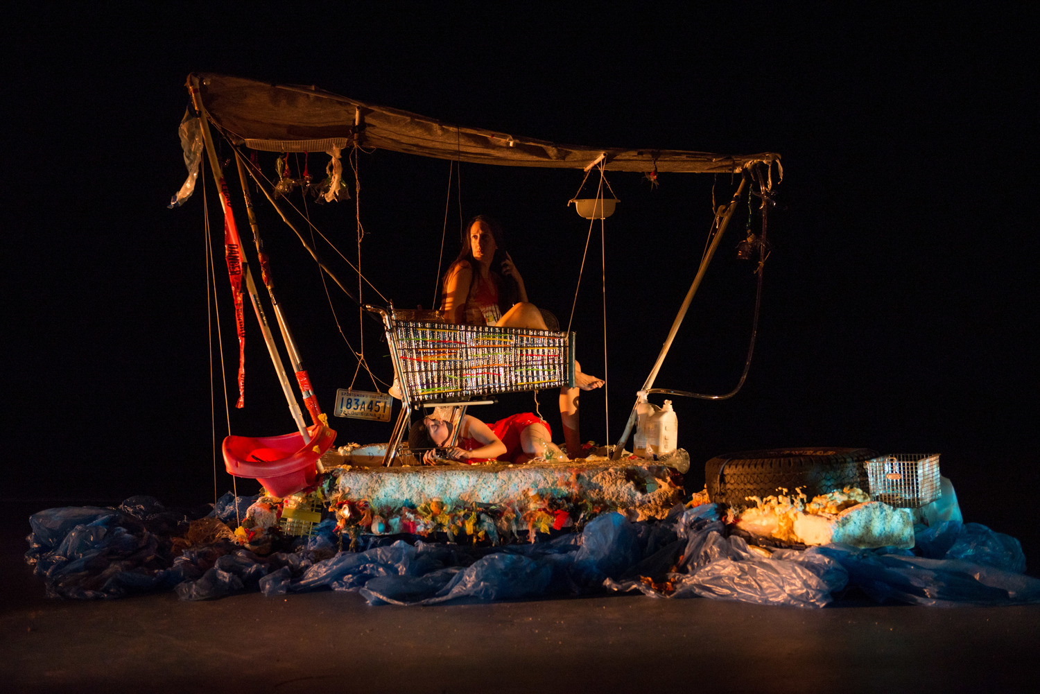 "Megan Reilly's lighting is top-tier, tripping on the effervescent textiles and metallic objects that comprise the flotilla at the center of it all." The Austin Chronicle, 9/19/2014