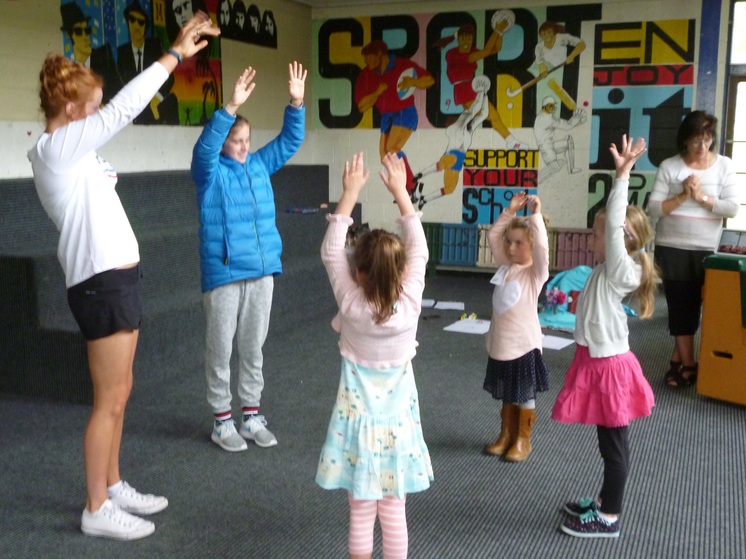 Amy Young, Laura Paterson and Sophie Parris from the ‘Tui Group’ perform a dance of prayer to ‘Prayer of Peace’ by David Haas supported by Ella McGuigan, Maggie Nicholson and Faye Hanna.
