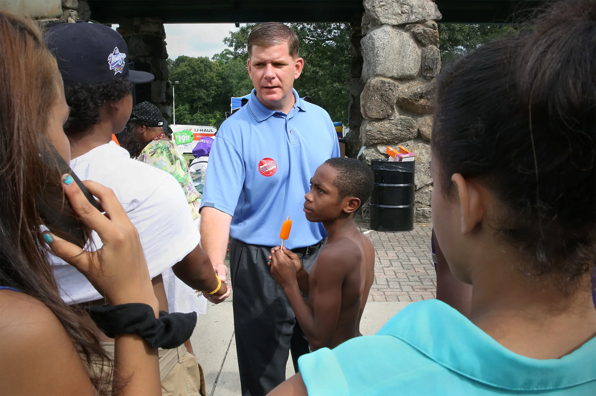 Mayoral hopeful, Marty Walsh, speaks with Boston youth during a Scoops 'N Hoops event in Dorchester, MA. July 27, 2013 