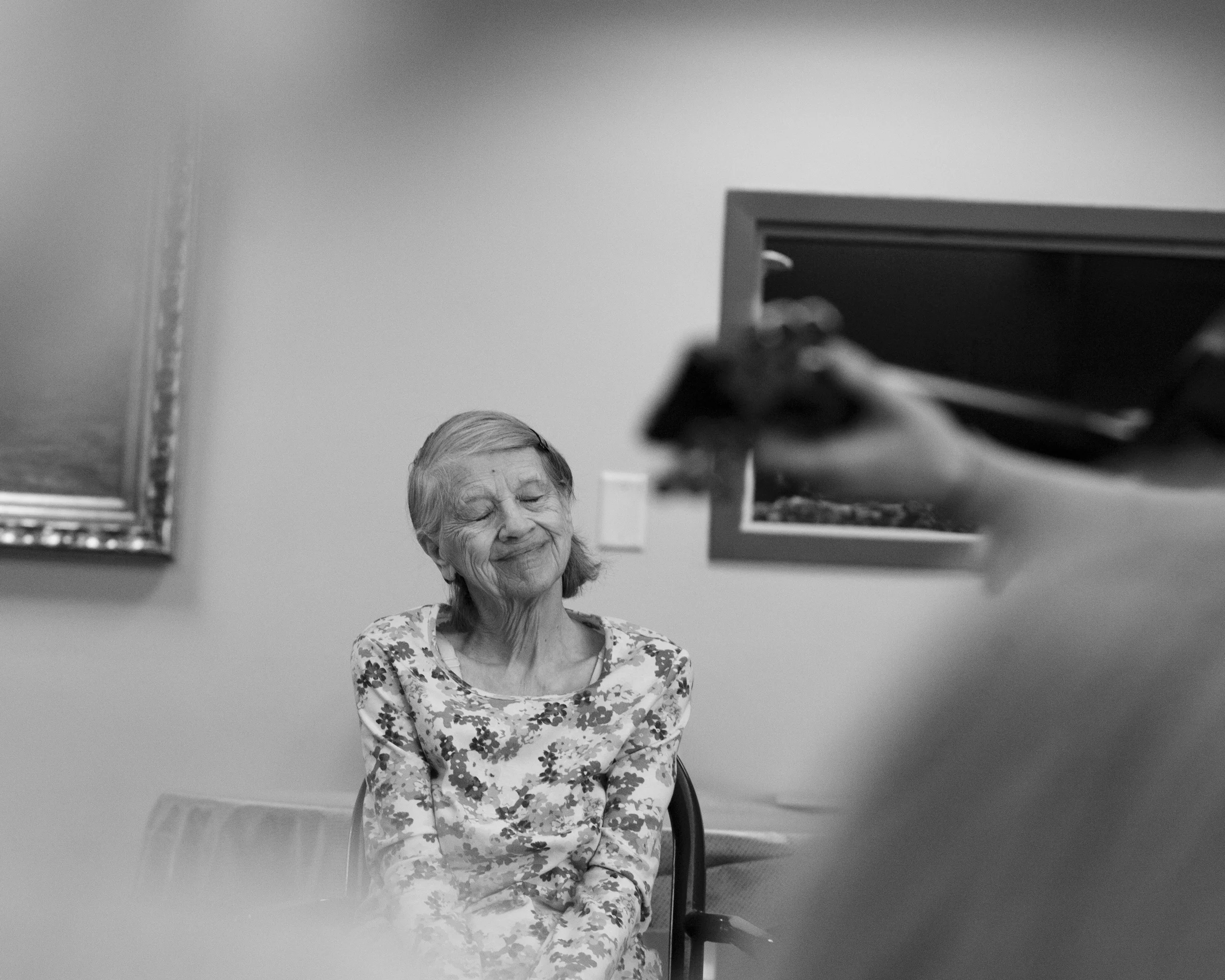  Alzheimer's resident Lousie Walbridge enjoys a song during music therapy at Amber Way in Kalamazoo, MI on February 26, 2015. Amber Way provides residents suffering from Alzheimer's and dementia with music therapy twice a week. 