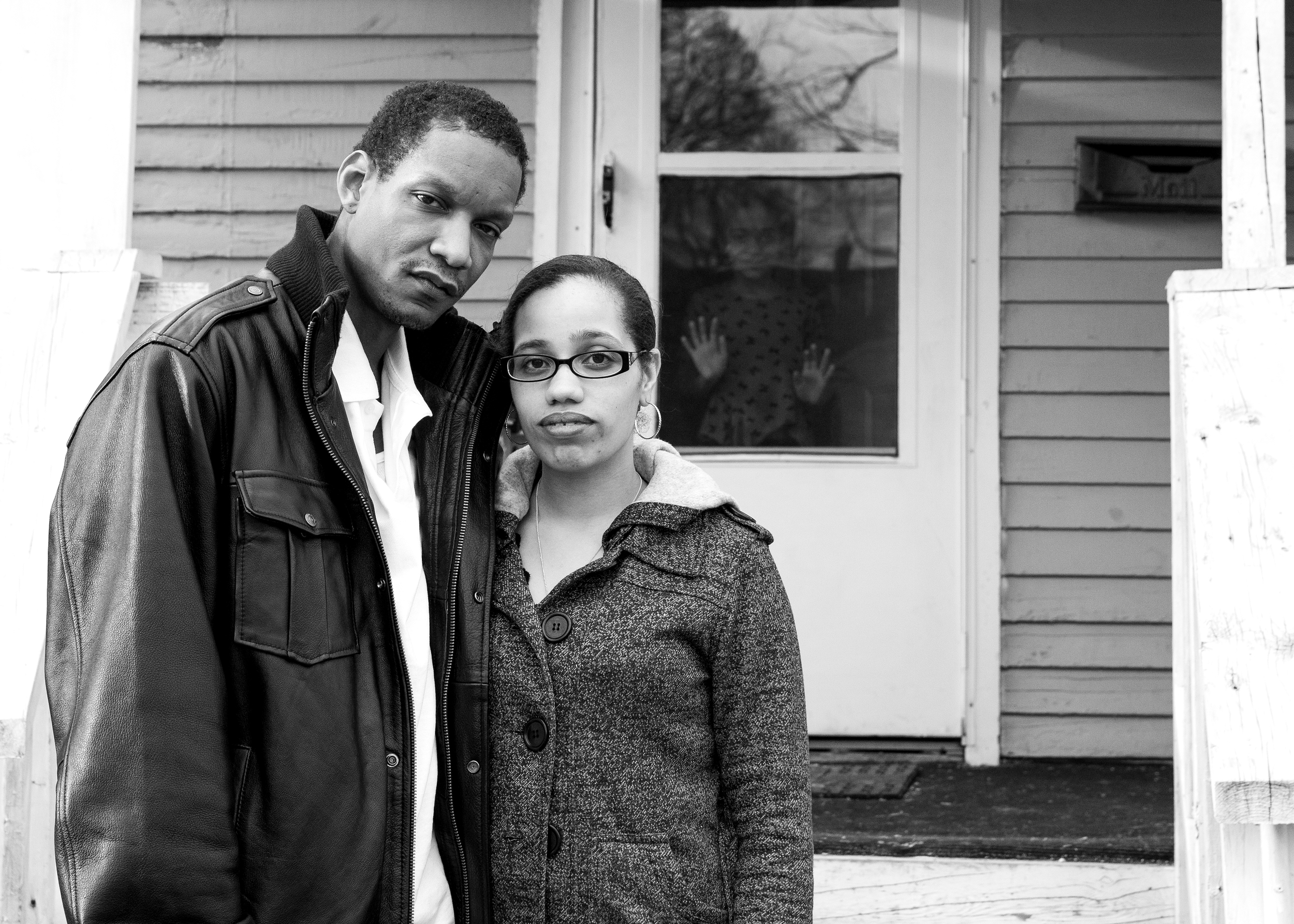James Wilco and Natalia Smith stand in front of their home in the Edison neighborhood of Kalamazoo, MI on March 16, 2015. They moved from the Southside of Chicago to be in a safer area.