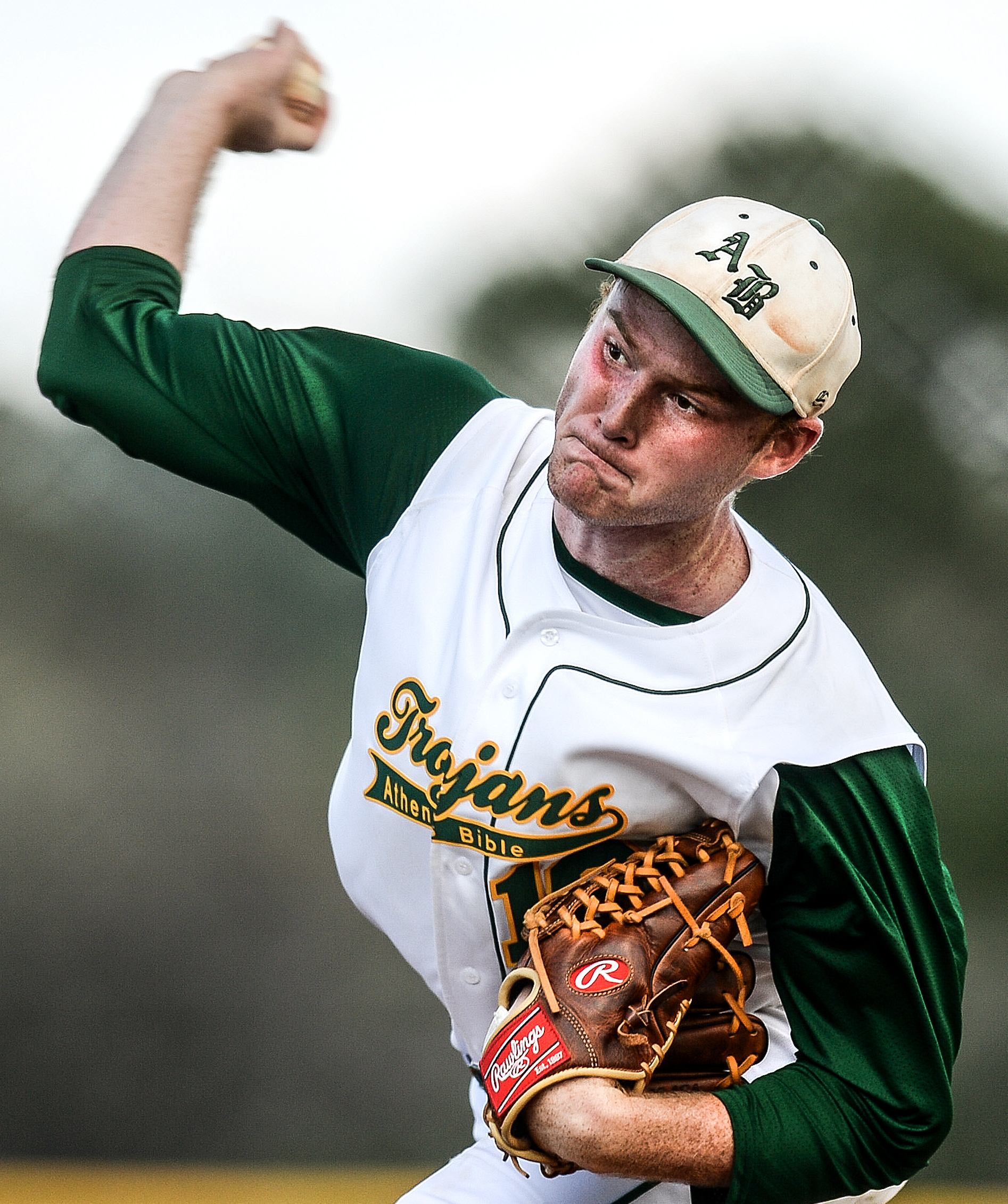 Athens Bible's Kenneth Adams throws a pitch to Lindsay Lane Christian Academy at Athens Bible School on Tuesday March 28, 2017.