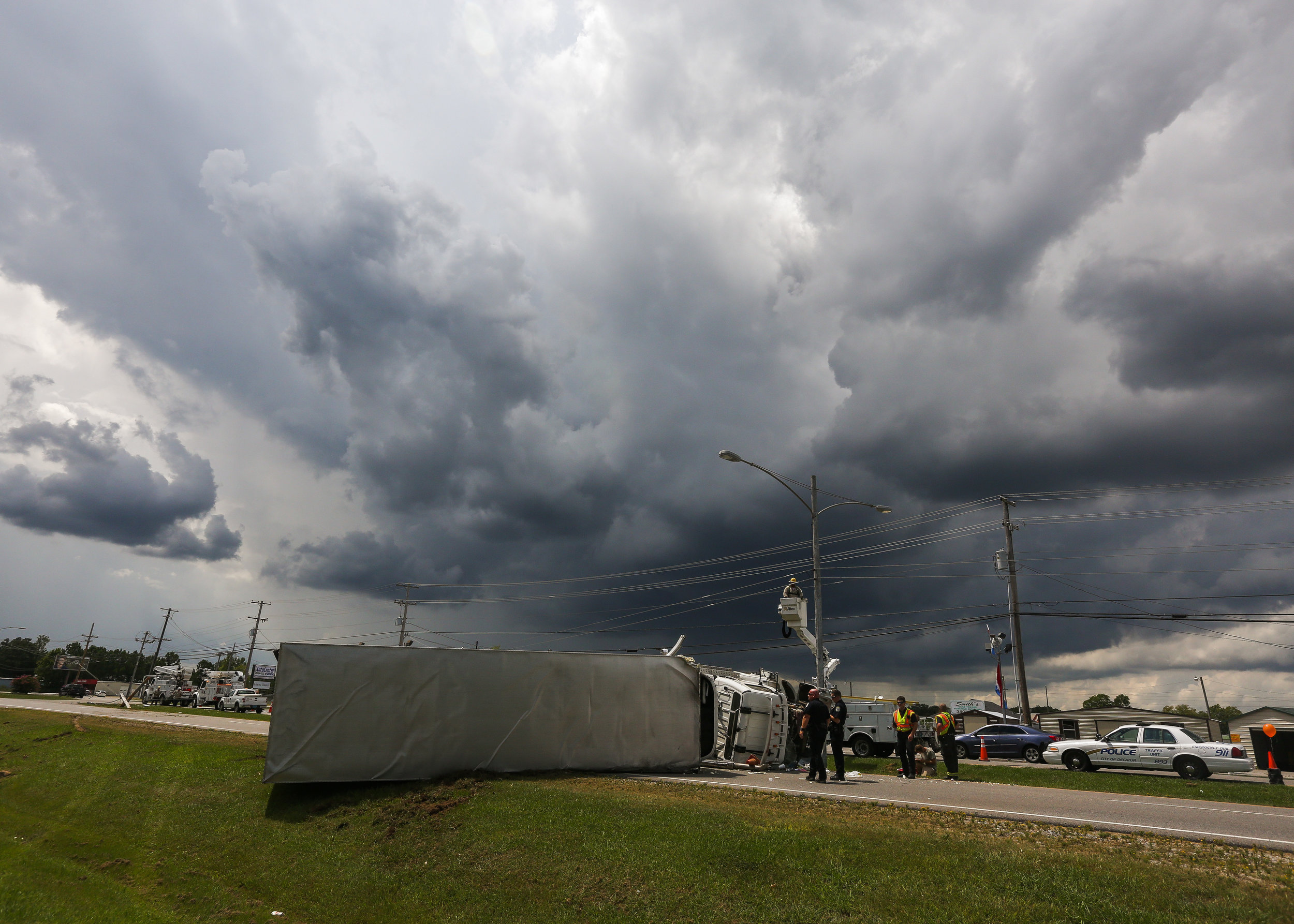 A semi truck heading north near 3622 U.S. 31 hit a pole and landed on its side in Decatur, Alabama. 