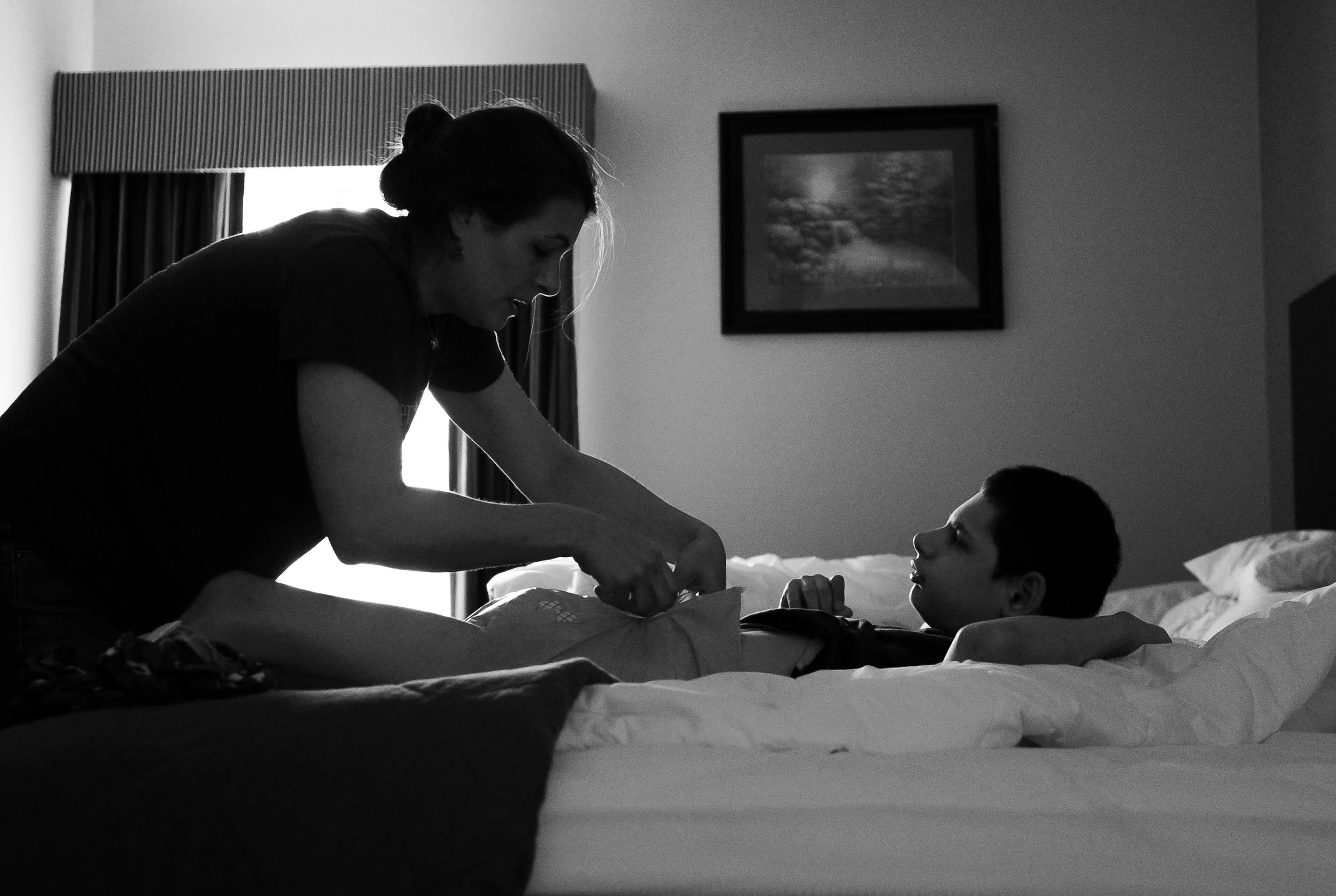  Jody Perkins changes her son Robert's diaper in Montgomery, Ala., on April 14, 2016. After Robert was born, he unexpectedly stopped breathing and doctors determined he’d suffered a bilateral stroke in utero. The stroke killed the back half of Robert