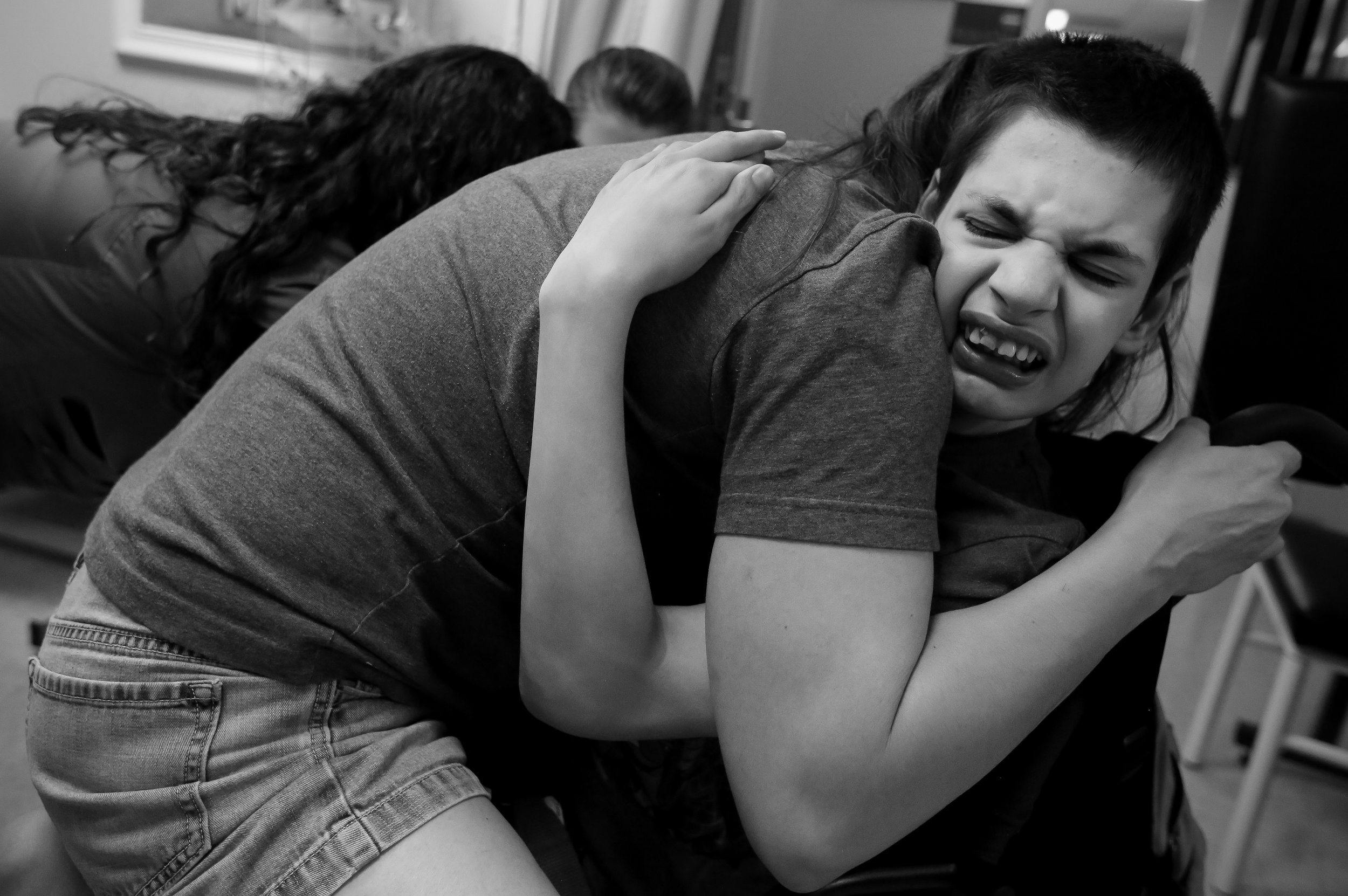  Jody pins Robert to a chair during a blood draw at Decatur Morgan Hospital, October 10, 2016.&nbsp; Every three months, doctors test Robert’s blood to monitor his Banzel and Onfi levels. Banzel was the pharmaceutical drug developed for Lennox-Gastau