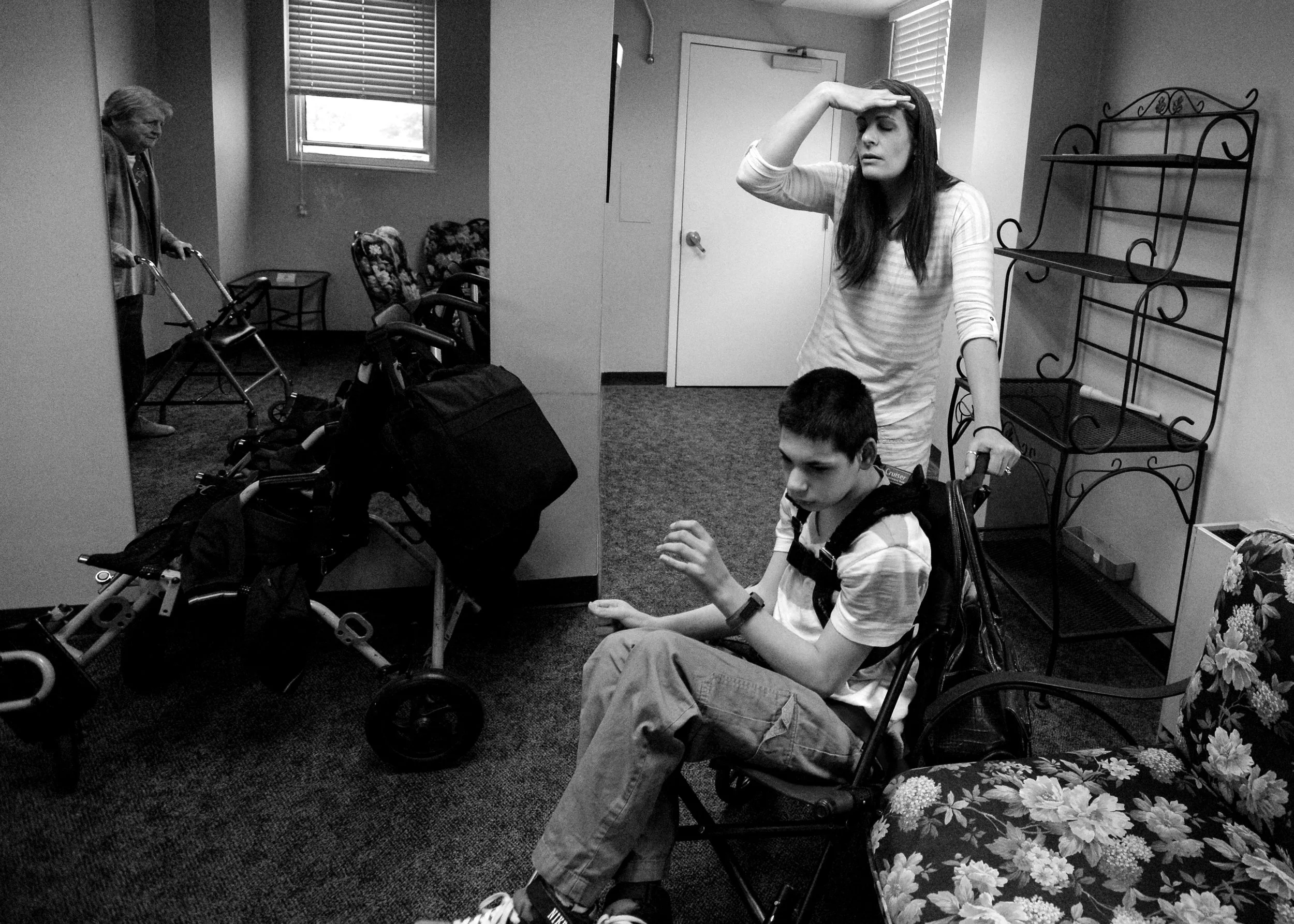  Jody takes a moment to gather herself at the Alabama State House in Montgomery prior to a vote on Leni's Law, April 14, 2016.&nbsp; During the three months the House was in session, Jody, Robert and Jody’s mother-in-law, Ginny (left), drove the six-
