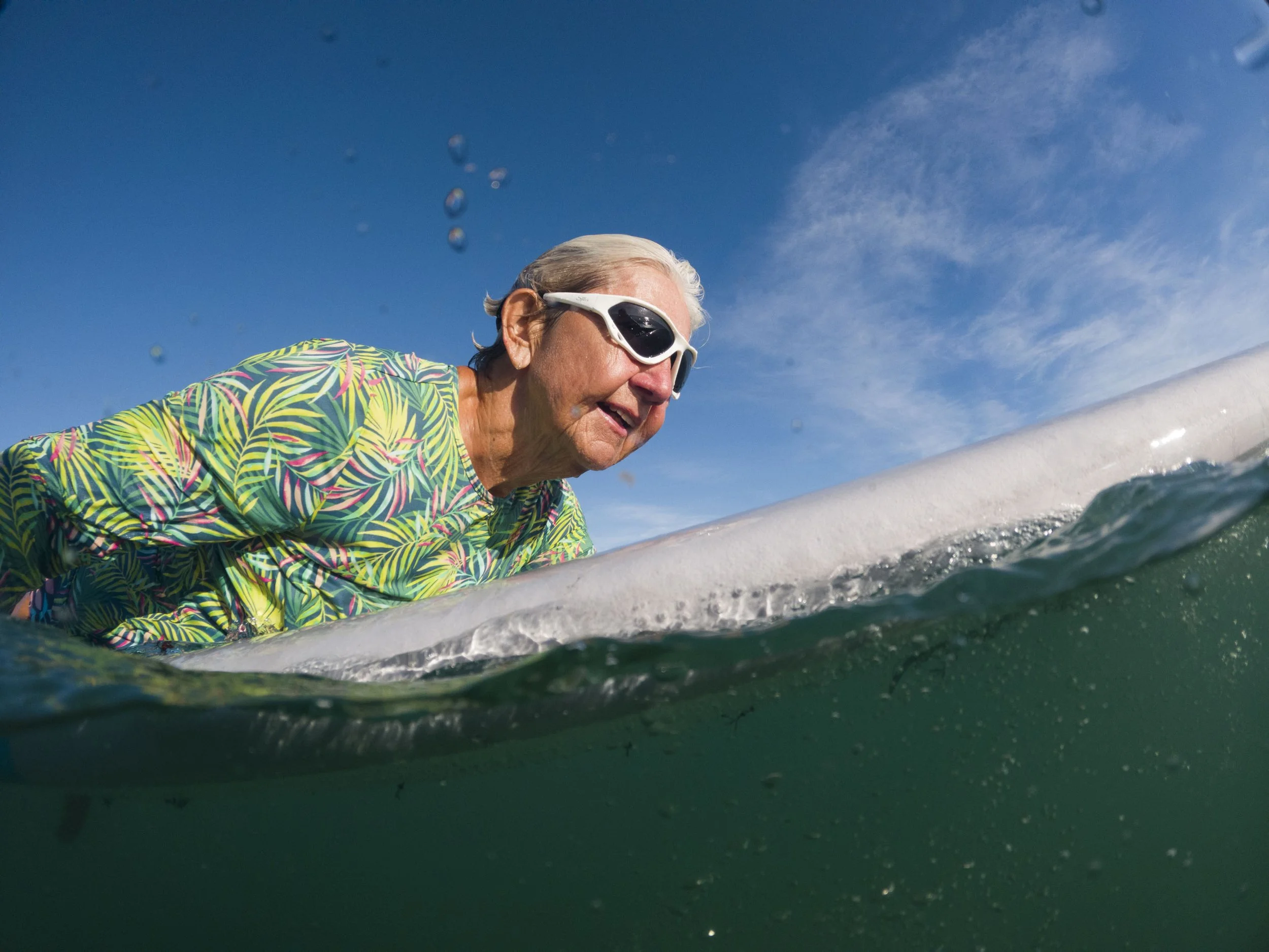  Nicki Campbell, 81, of Stuart, waits for a wave, Thursday, Sept. 9, 2022, at Santa Lucea Beach on Hutchinson Island. "I love to taste the saltwater when I get in. You float both physically and mentally, you’re one with the water," said Campbell. 