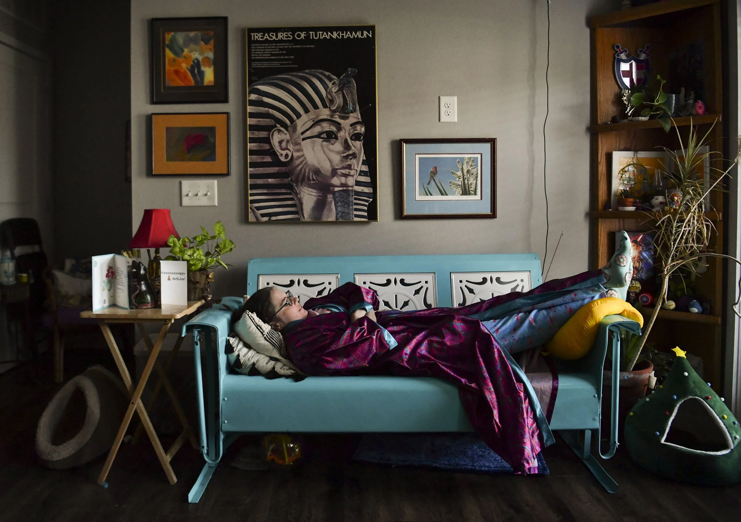  Rebecca Schleider, 41, rests in her living room, Thursday, April 27, 2023, in Stuart. Schleider has lived with long COVID since contracting the virus during the first wave in 2020. "I'm too unwell to do most outside activities," said Schleider. "It'
